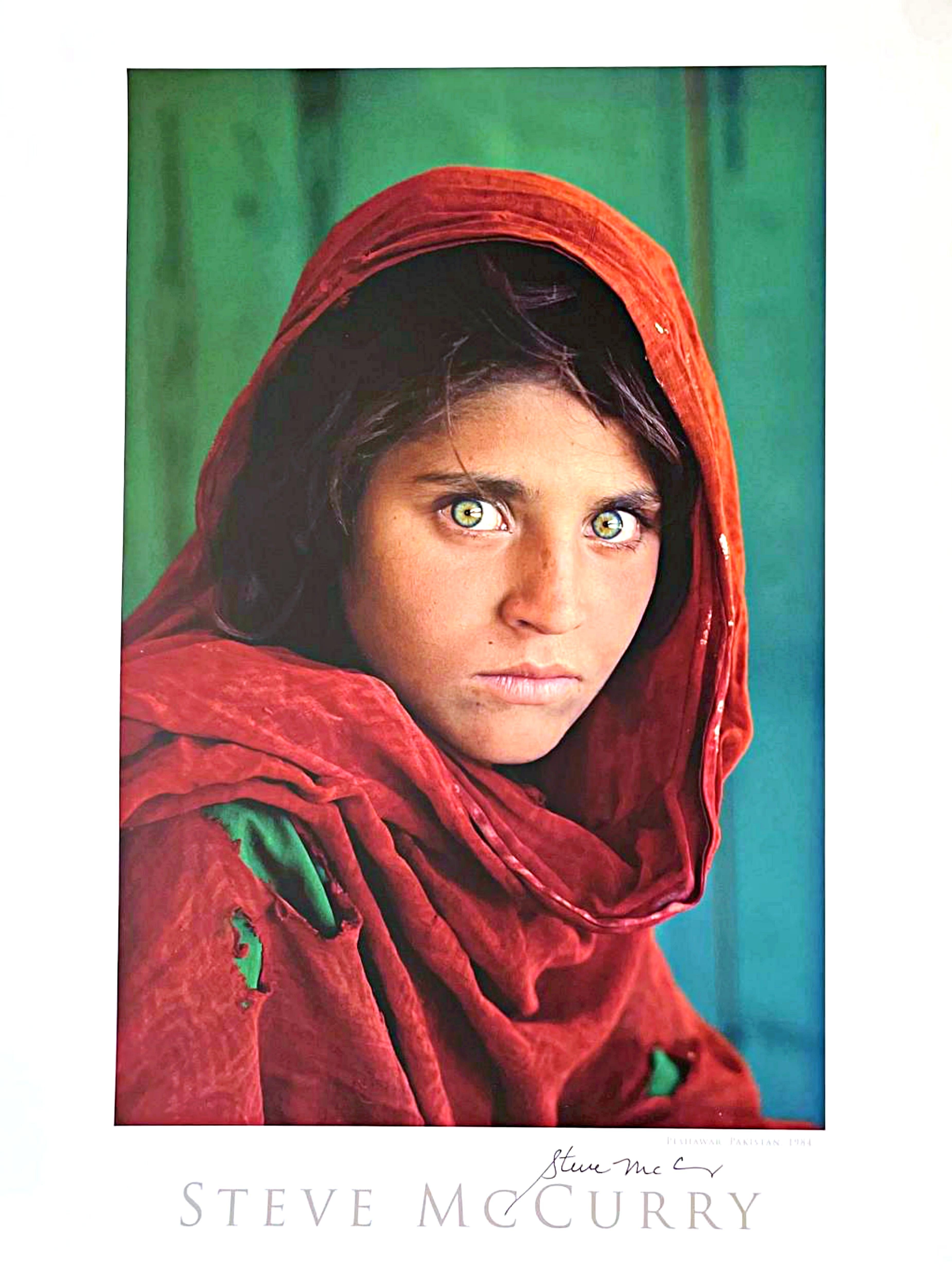 Steve McCurry
Sharbat Gula, Afghan Girl, Pakistan (Hand Signed), 1984
Offset Lithograph poster 
Hand signed by the photographer in black felt pen on the front
24 × 20 inches
Unframed
This offset lithograph poster features famed photographer Steve