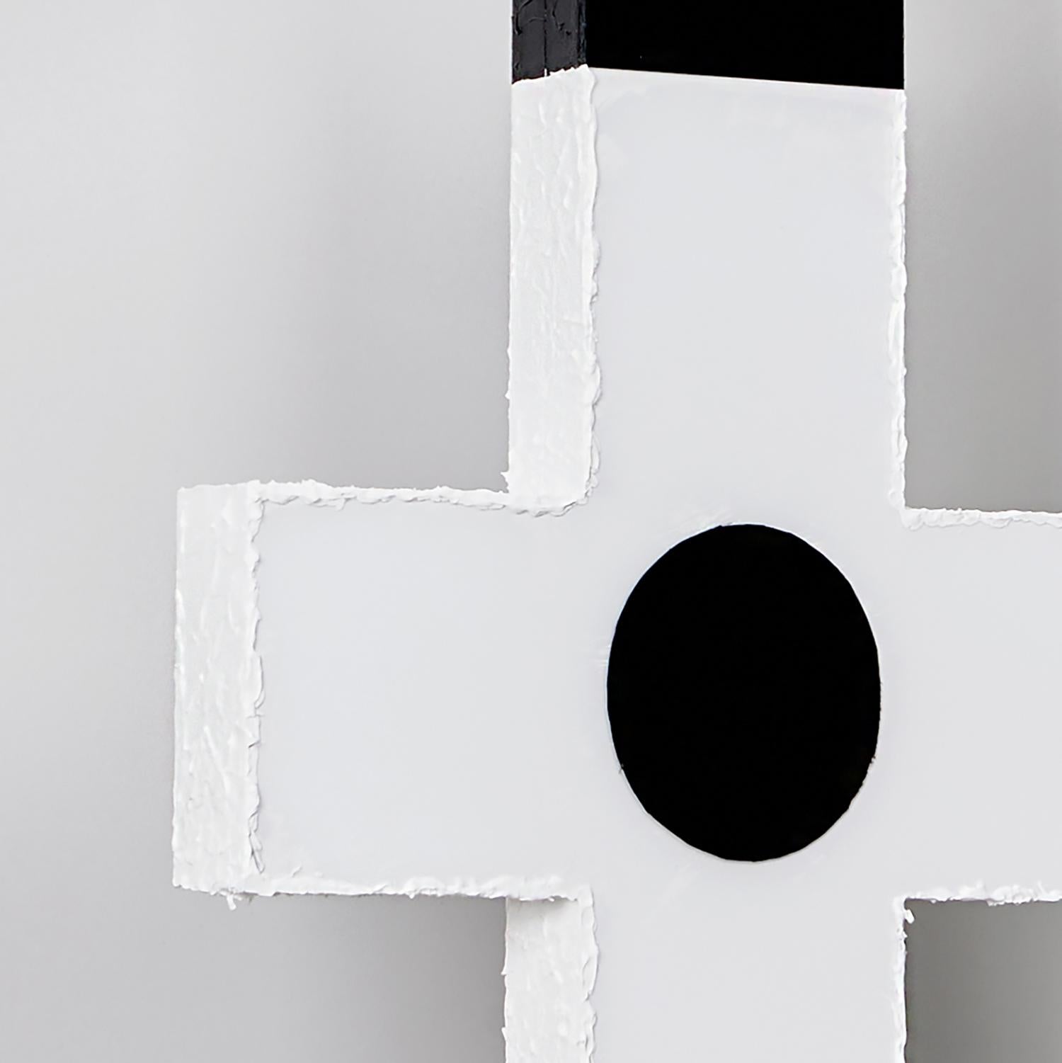Steve Sangapore’s “I'm Neither Good Nor Evil, Or I'm Both” is a 44 x 13.5 x 1.75 inch mixed media wall-hung sculpture from his Modern Icon series. The black and white mixed media sculpture is a double cross shape combined with the eastern Taoist