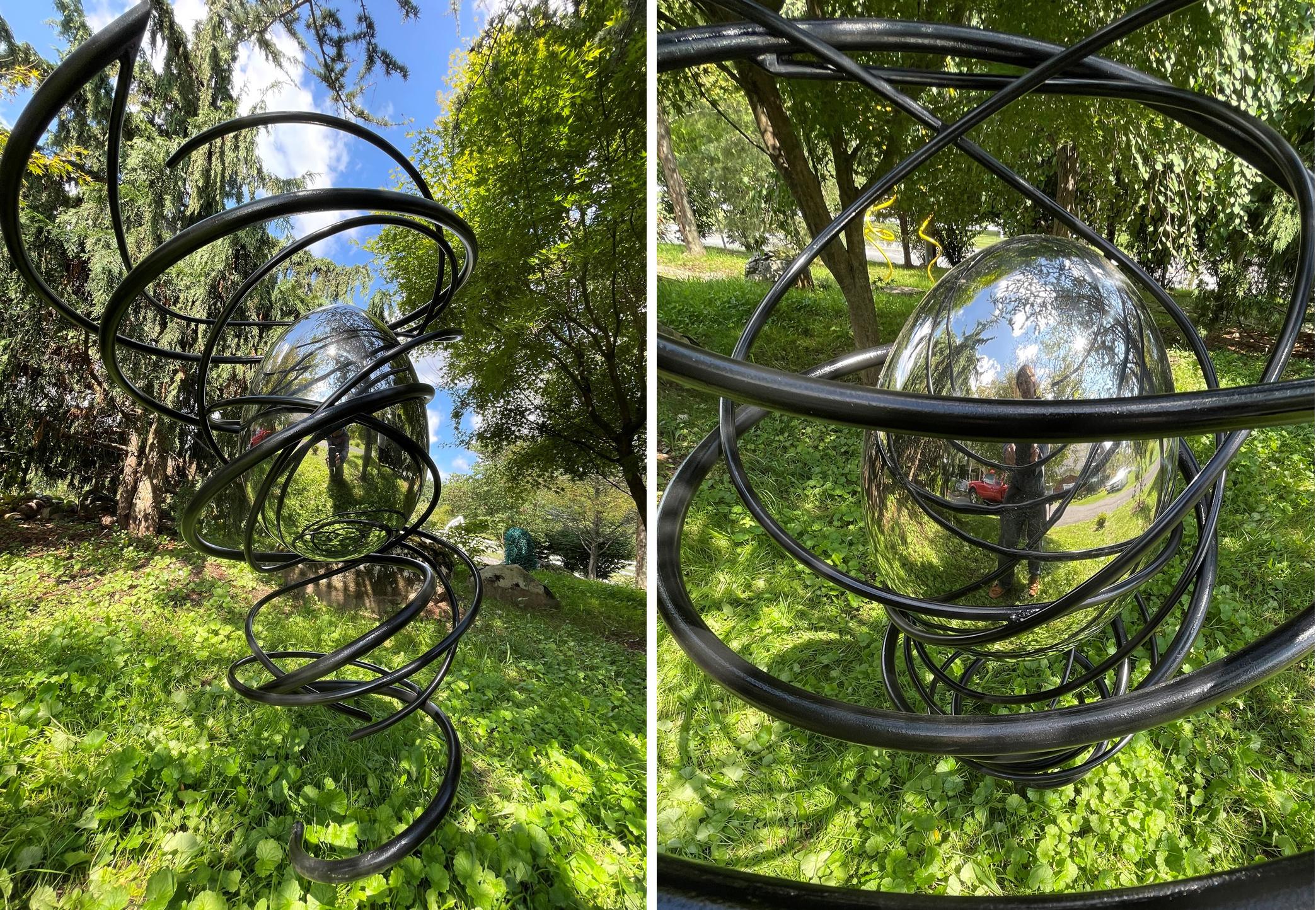 A mirror polished stainless steel egg reflects its environment while the steel "tornado" holds the egg up to create more drama. Beautiful in the garden!
One of a kind and signed by the artist.
Other sizes available by commission. Veuillez vous