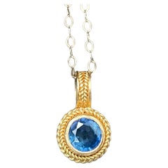 Steven Battelle 0.6 Carats Blue Sapphire 22K Gold Pendant