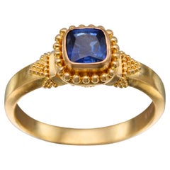 Steven Battelle, bague en or 22 carats avec saphir bleu de 0,7 carat