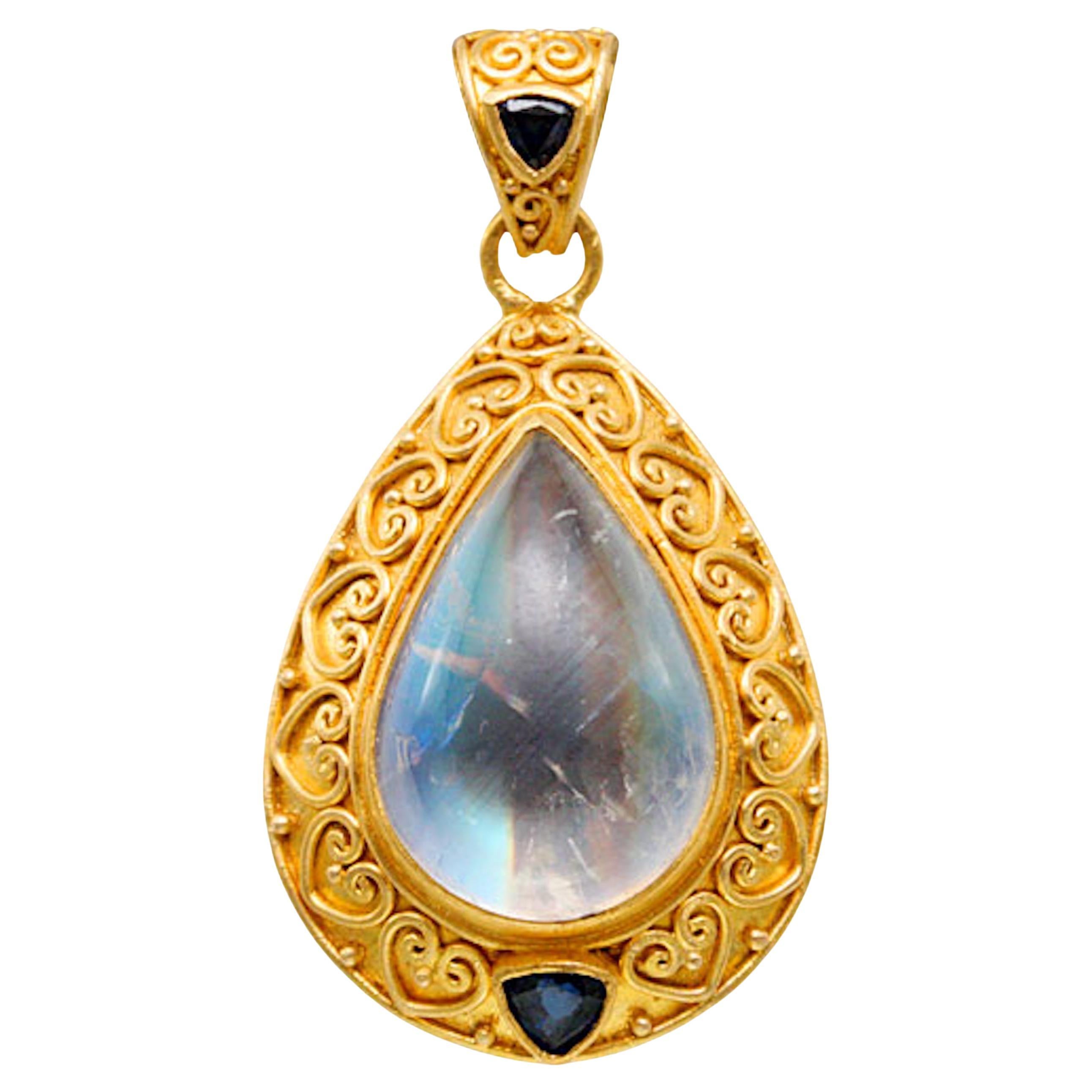 Colgante Steven Battelle Piedra lunar arco iris de 11,5 quilates Zafiro azul de 22 quilates
