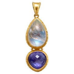 Colgante de oro de 18 quilates Steven Battelle Piedra de luna arco iris tanzanita de 11,6 quilates