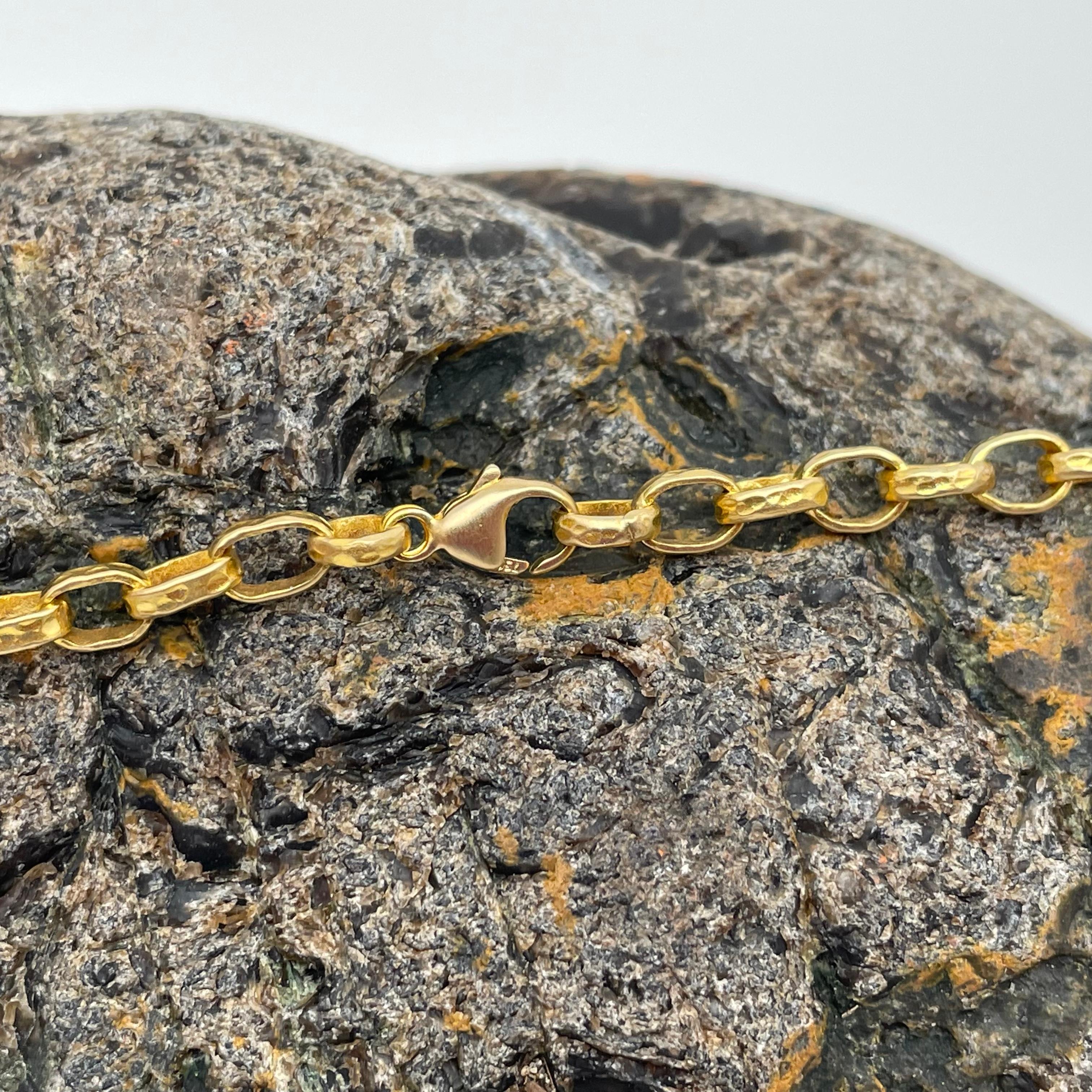 A unique handmade hammered organically textured chain with matt-finish provides a beautiful way to display your treasured pendants.  1.5 mm width.  Substantial 21 grams weight.  Also available in 20 and 24 inch lengths.