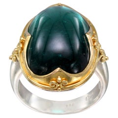Steven Battelle, bague en or 18 carats avec tourmaline verte cabochon de 22,5 carats