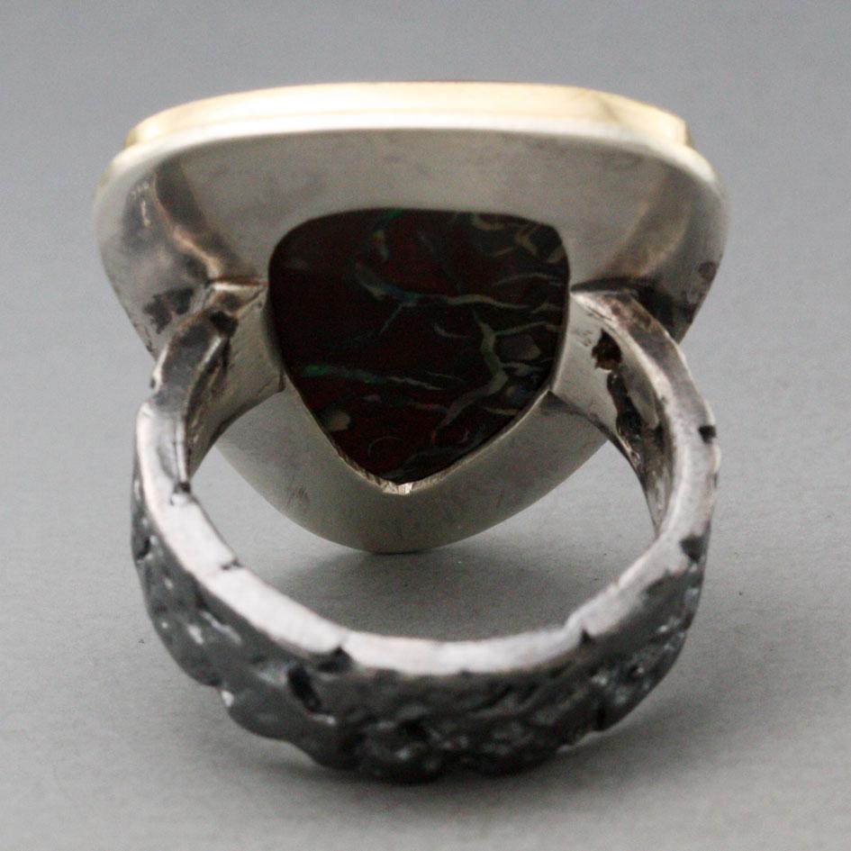 Contemporary Steven Battelle 23.3 Carats Koroit Boulder Opal Oxidized Sterling 18K Gold Ring For Sale