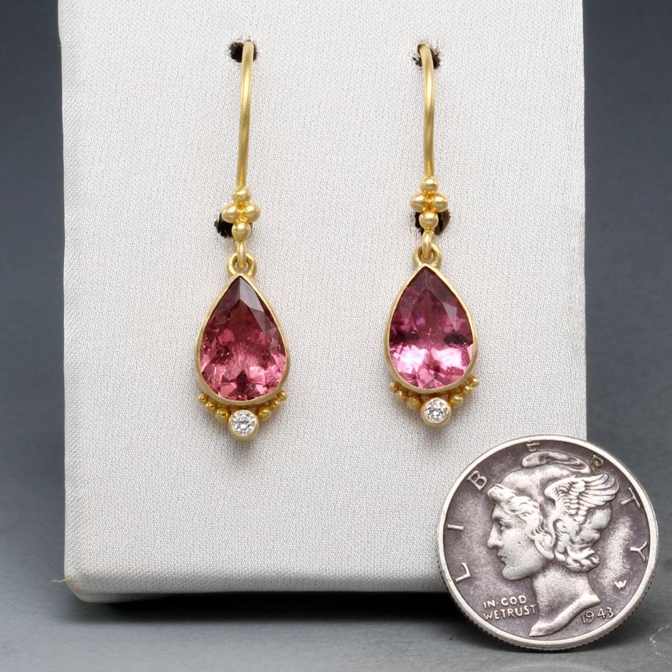 Two 7 x 10 mm pear-shaped faceted pink tourmalines dangle below safety clasp 18K gold ear wires with 4 small 