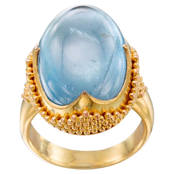 Steven Battelle, bague en or 22 carats avec aigue-marine cabochon 25,2 carats