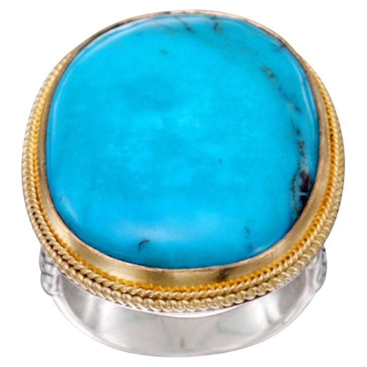 26.5 Carats Turquoise Silver and 18K Gold Ring