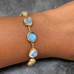 Steven Battelle Pulsera de oro de 18 quilates con 27,1 quilates de piedra lunar arco iris