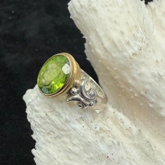 Steven Battelle Anillo de oro de 18 quilates y plata de ley con peridoto facetado de 3,7 quilates