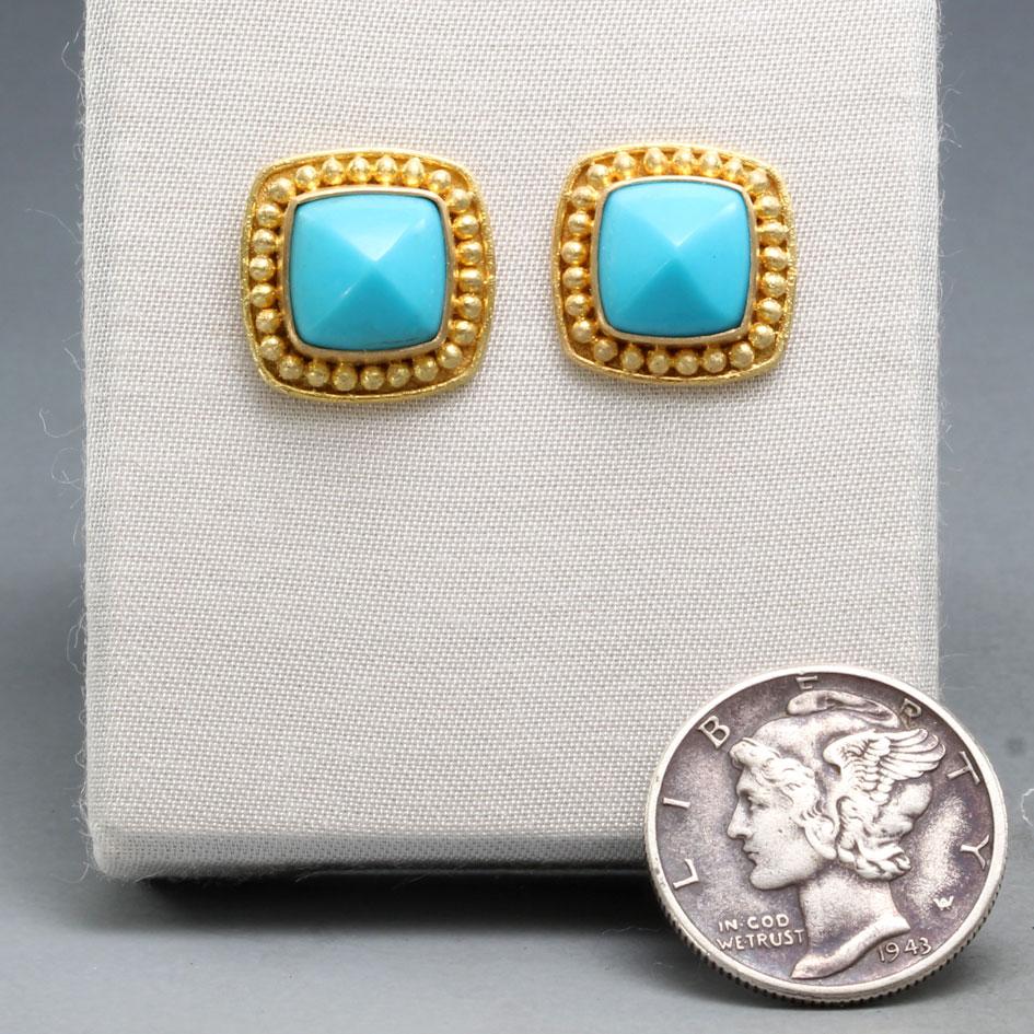 Two flawless 8 mm pyramid shaped cabochons of sky blue Arizona Sleeping Beauty mine turquoise are surrounded by evenly spaced 