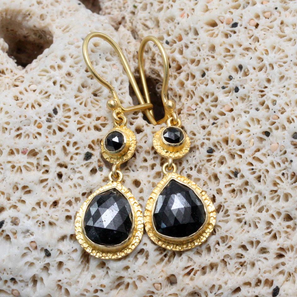 Two 7x 9 mm pear shaped black diamond rose cuts dangle below 3 mm similar rounds, all surrounded by intricate organic hand textured bezels in this classic creation.  Safety clasp wires complete. delightful!
