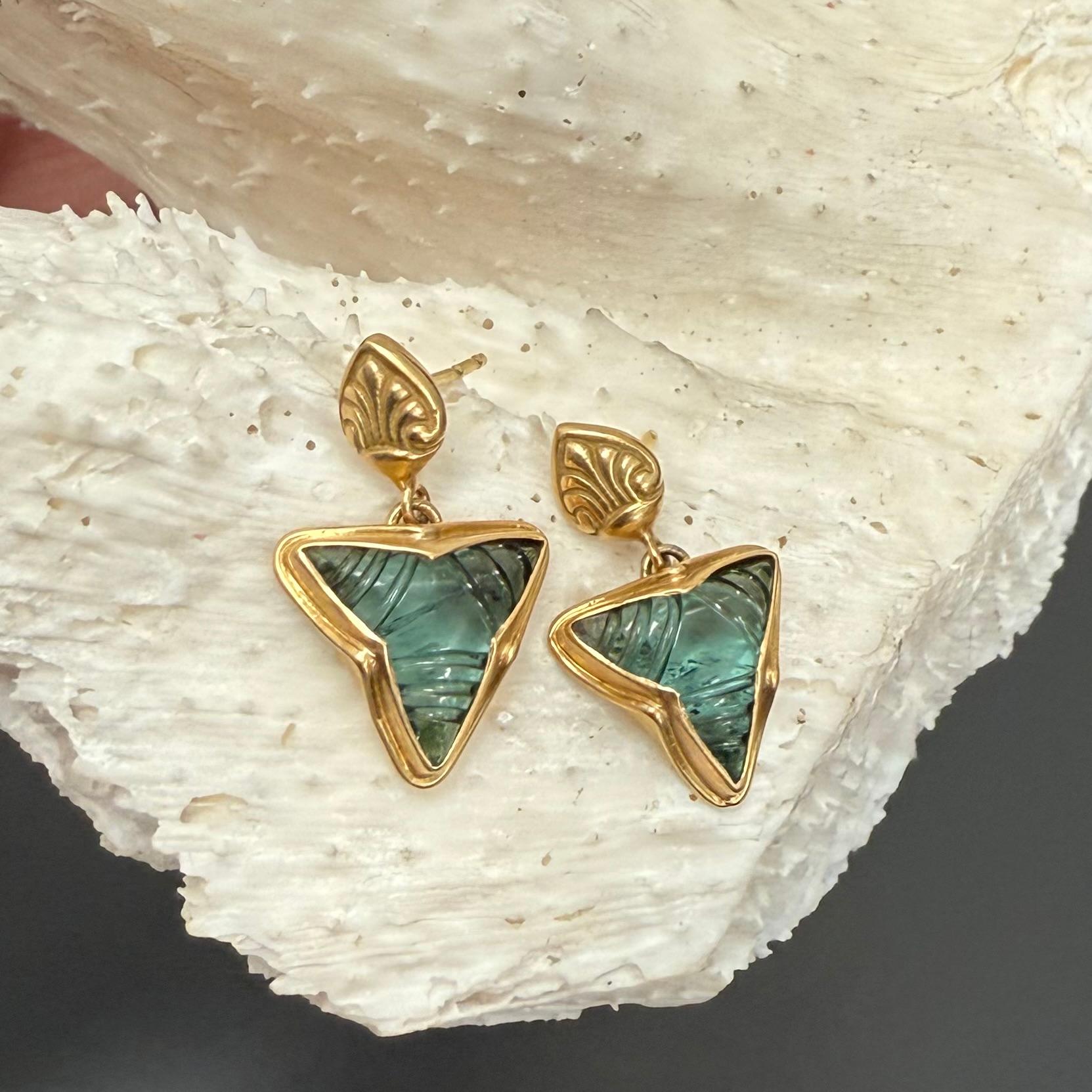 Two matching carved green-blue 