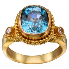 Steven Battelle Bague en or 22 carats avec zircon bleu 7,2 carats et diamants