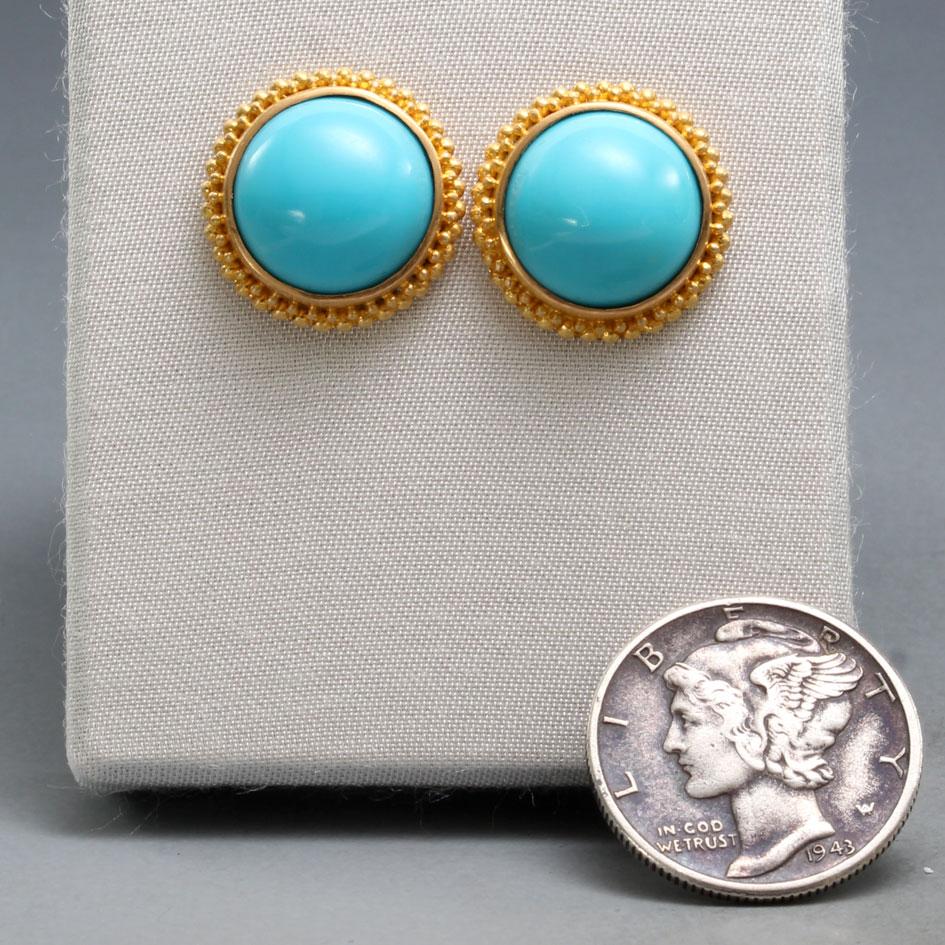 Two flawless 12mm round cabochons of Arizona Sleeping Beauty mine turquoise are surrounded by intricately hand-stacked large/small 