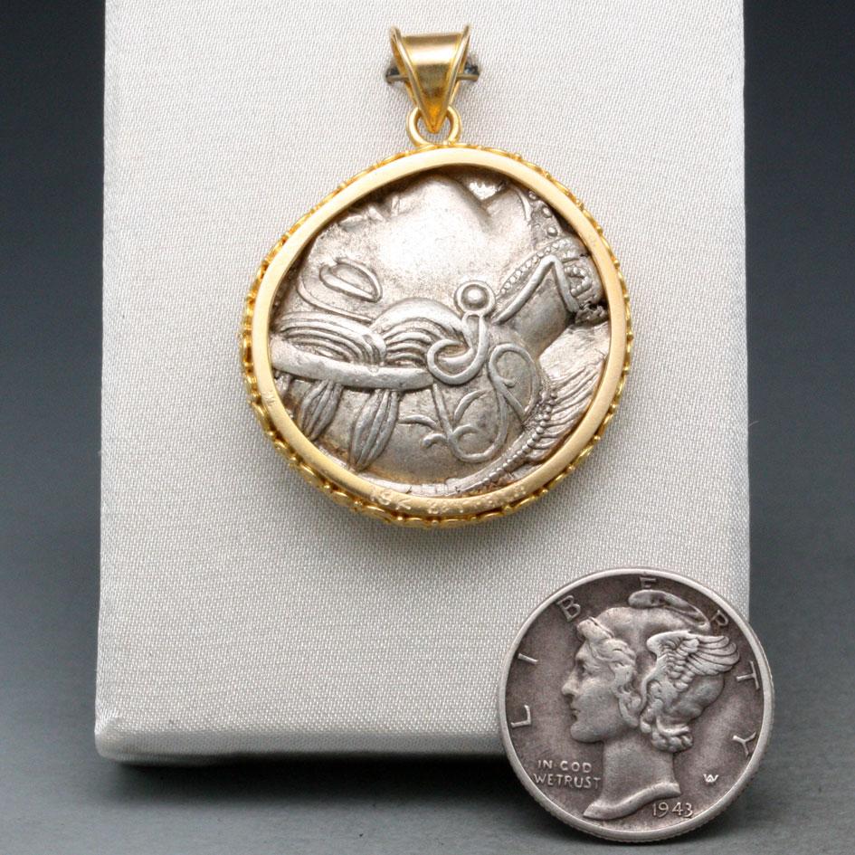 Spectacular Authentic Ancient Greek Coin Owl Athena and Diamond, set in multi-spirals handmade bezel solid 18K gold.

This coin from Athens, Attica, 449-404 BC, is a tetradrachm (4 drachms) that was the primary coinage in much of the ancient world