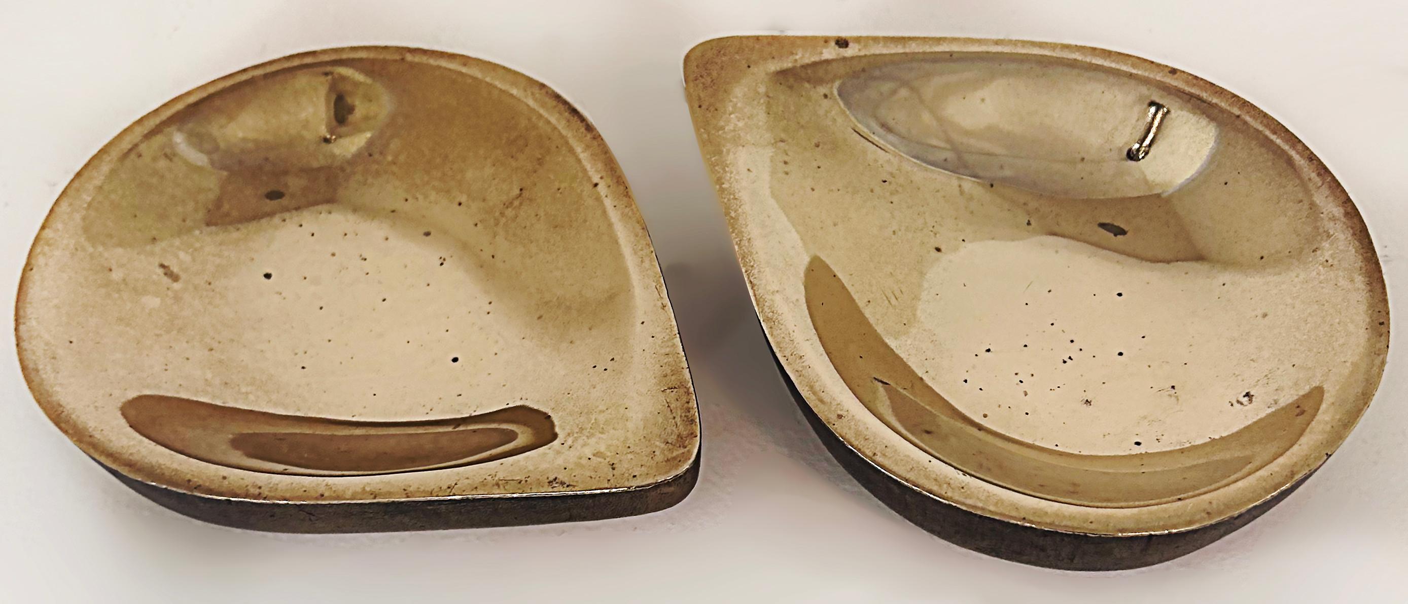 Steven Haulenbeek Ice Cast Bronze Teardrop Bowls, Heavy, Substantial Pair

Offered for sale is a pair of bras teardrop bowls by the American sculptural artist Steven Haulenbeek. The bowls are ice cast to create an interesting textural exterior