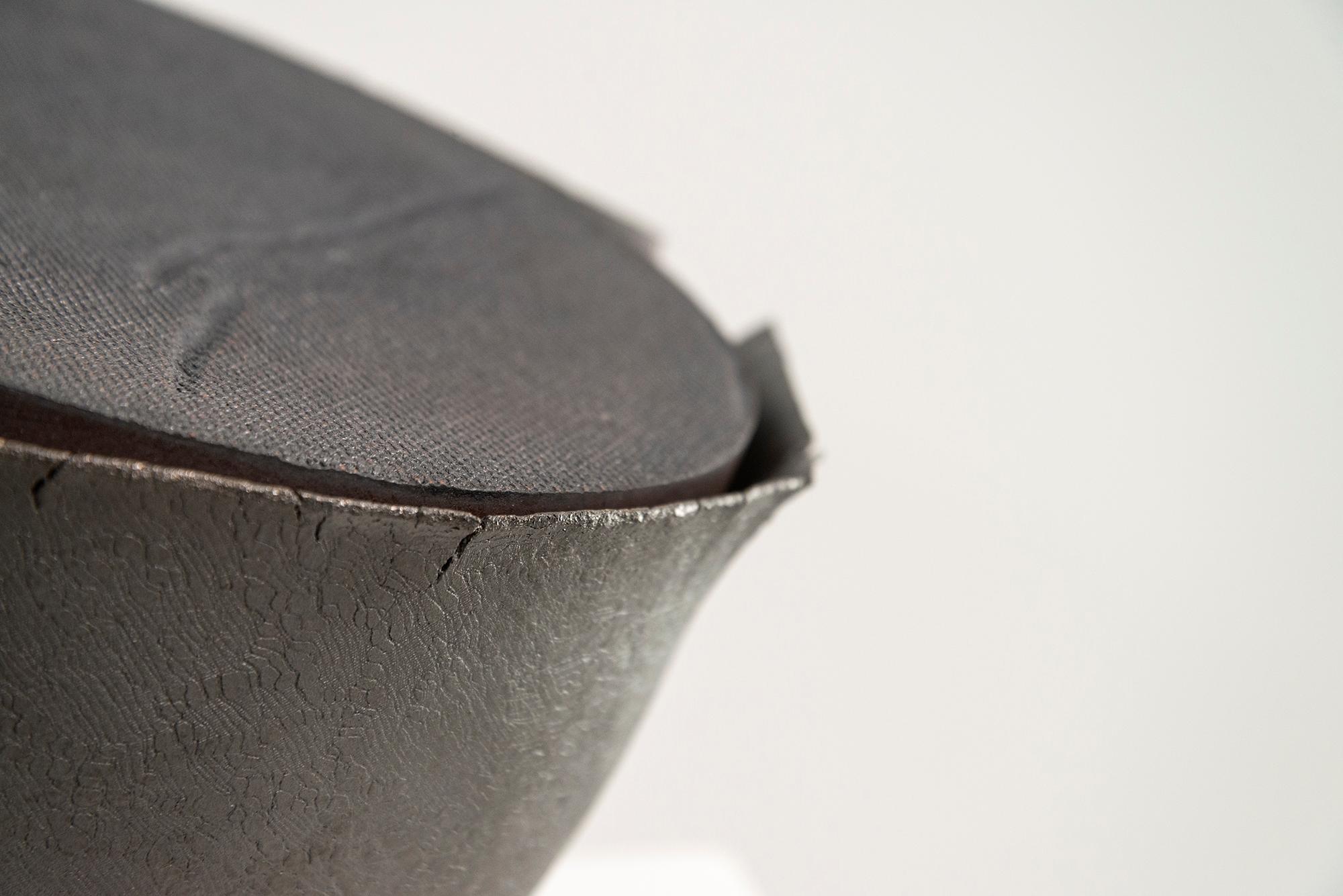 This contemporary ceramic piece was handmade by Steven Heinemann.

A gifted and technically brilliant artist, the ceramic artwork of Steven Heinemann has pushed the boundaries of ceramic art and afforded him international acclaim.
This series of