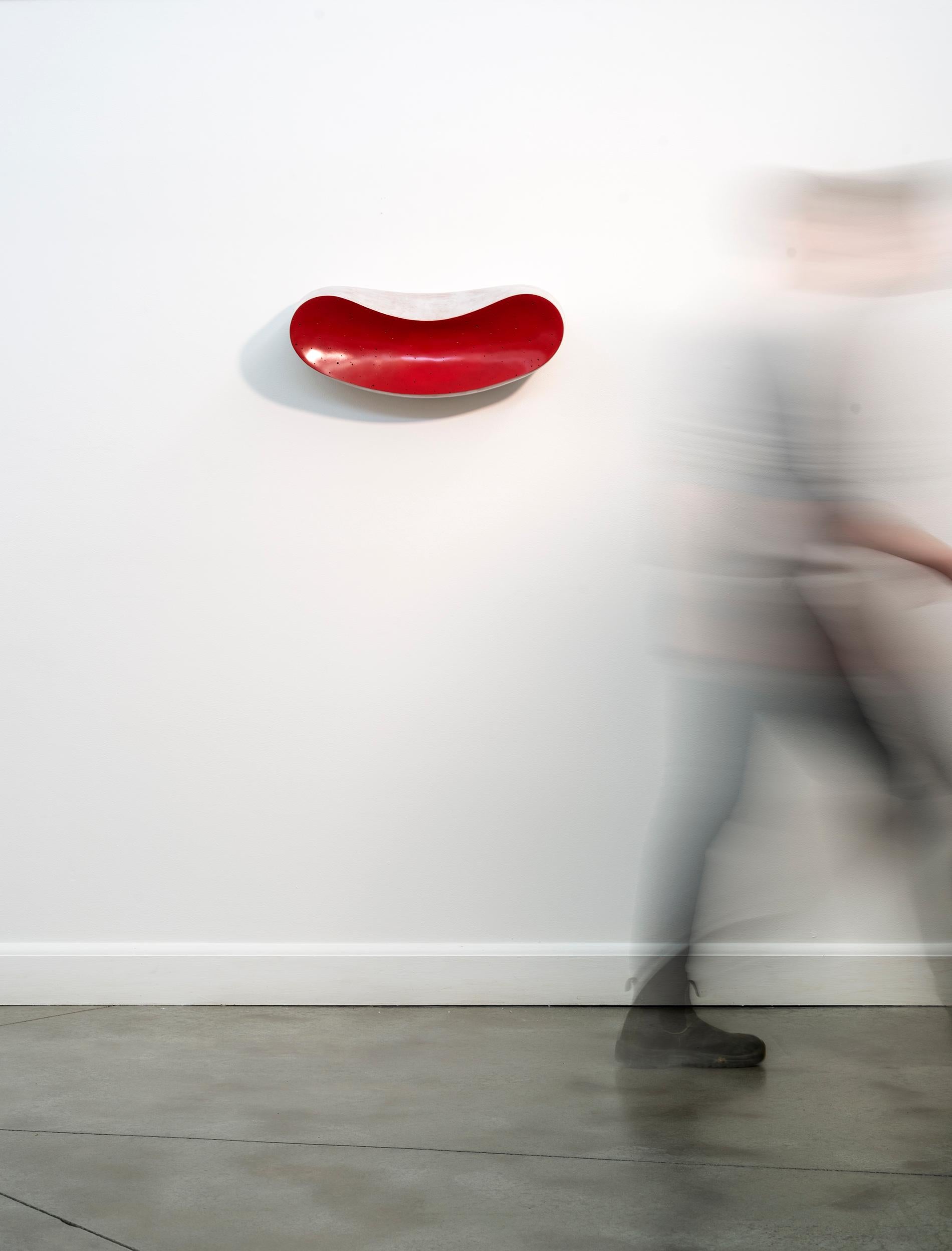 La Bouche - playful, red, white, abstract, elongated, ceramic wall sculpture - Abstract Sculpture by Steven Heinemann