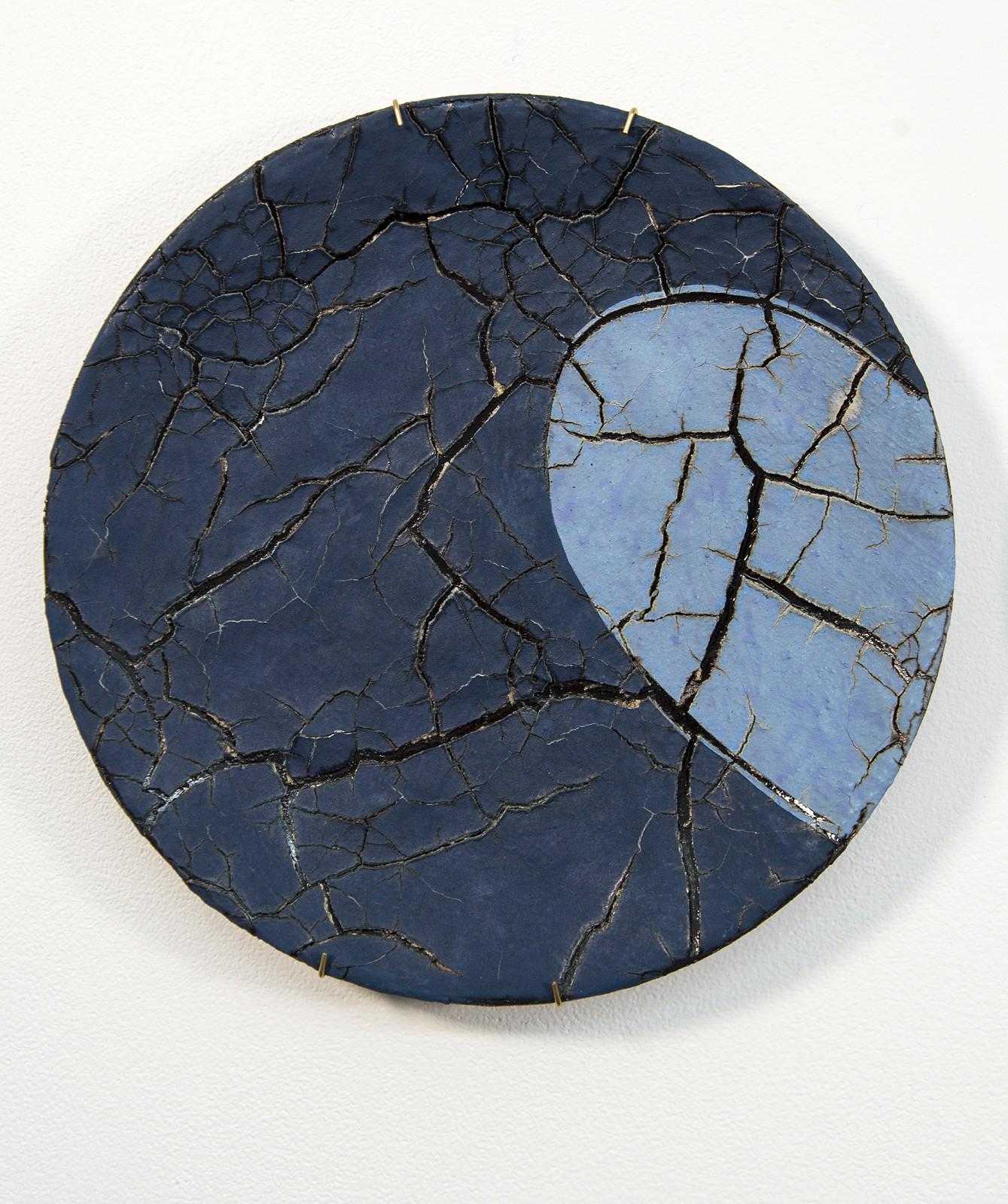 Canadian ceramicist Steven Heinemann has departed from his love of vessels to create two plates; each part of the whole. In colours ranging from sky blue to midnight blue, the plate’s pattern is reminiscent of a view of the world from above. The