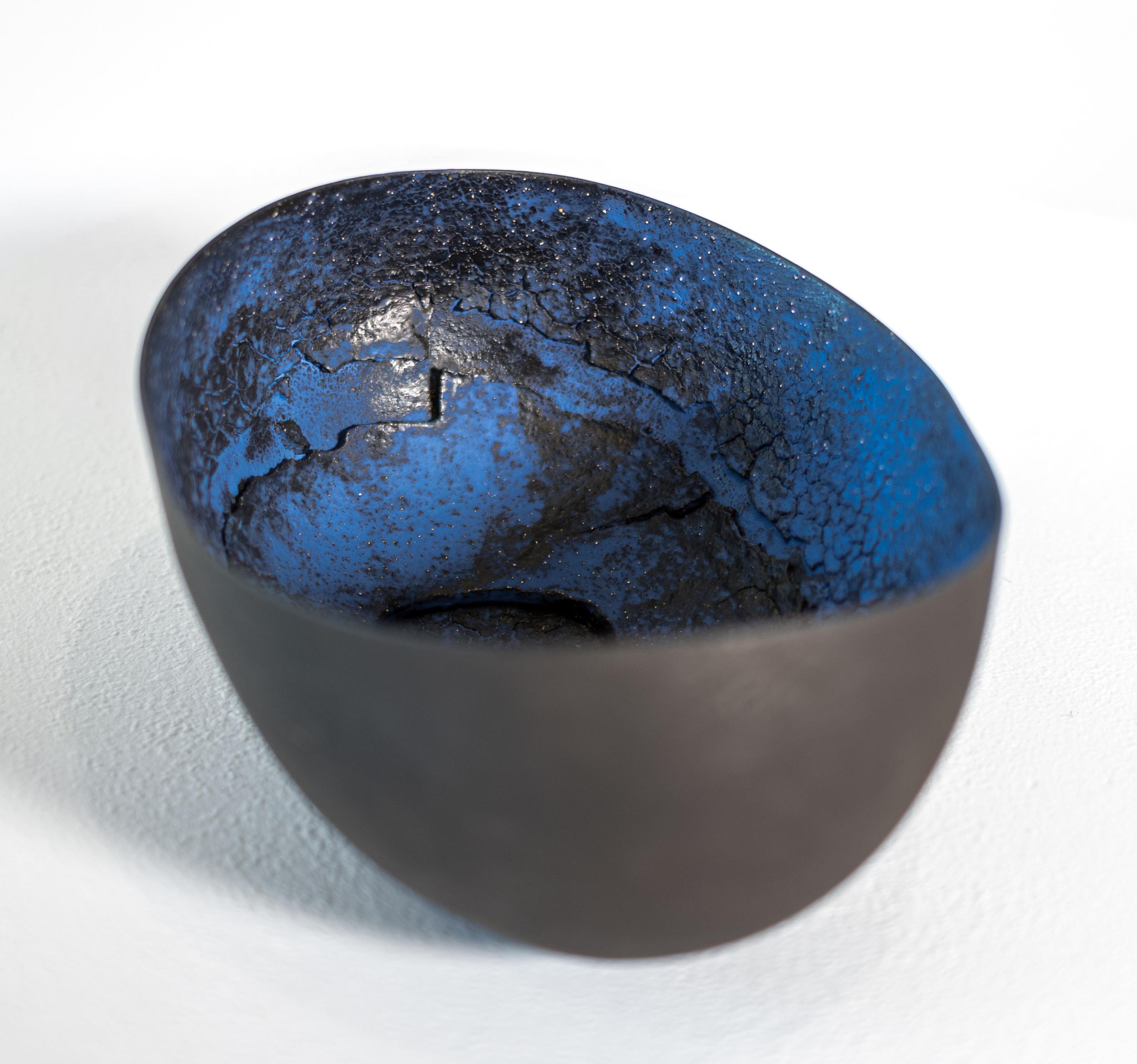 This contemporary sculptural vessel was handmade by Steven Heinemann.

Critics and collectors alike laud this Canadian artist’s distinctive aesthetic that has redefined the limits of ceramic art. Steven Heinemann has explored the ancient form of the