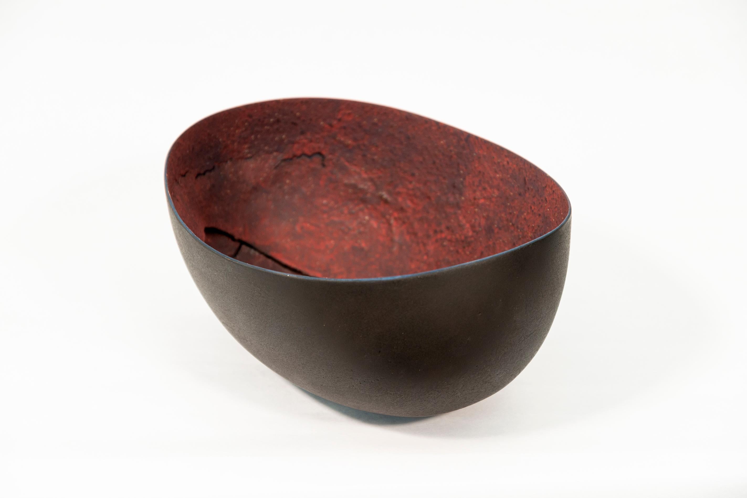 For Canadian ceramicist Steven Heinemann the humble shape of a bowl is an endless source of inspiration. One of a series of vessels, hand formed in clay, the organic oval shape of ‘Untitled’ is informed by nature. The black, smooth finish on the