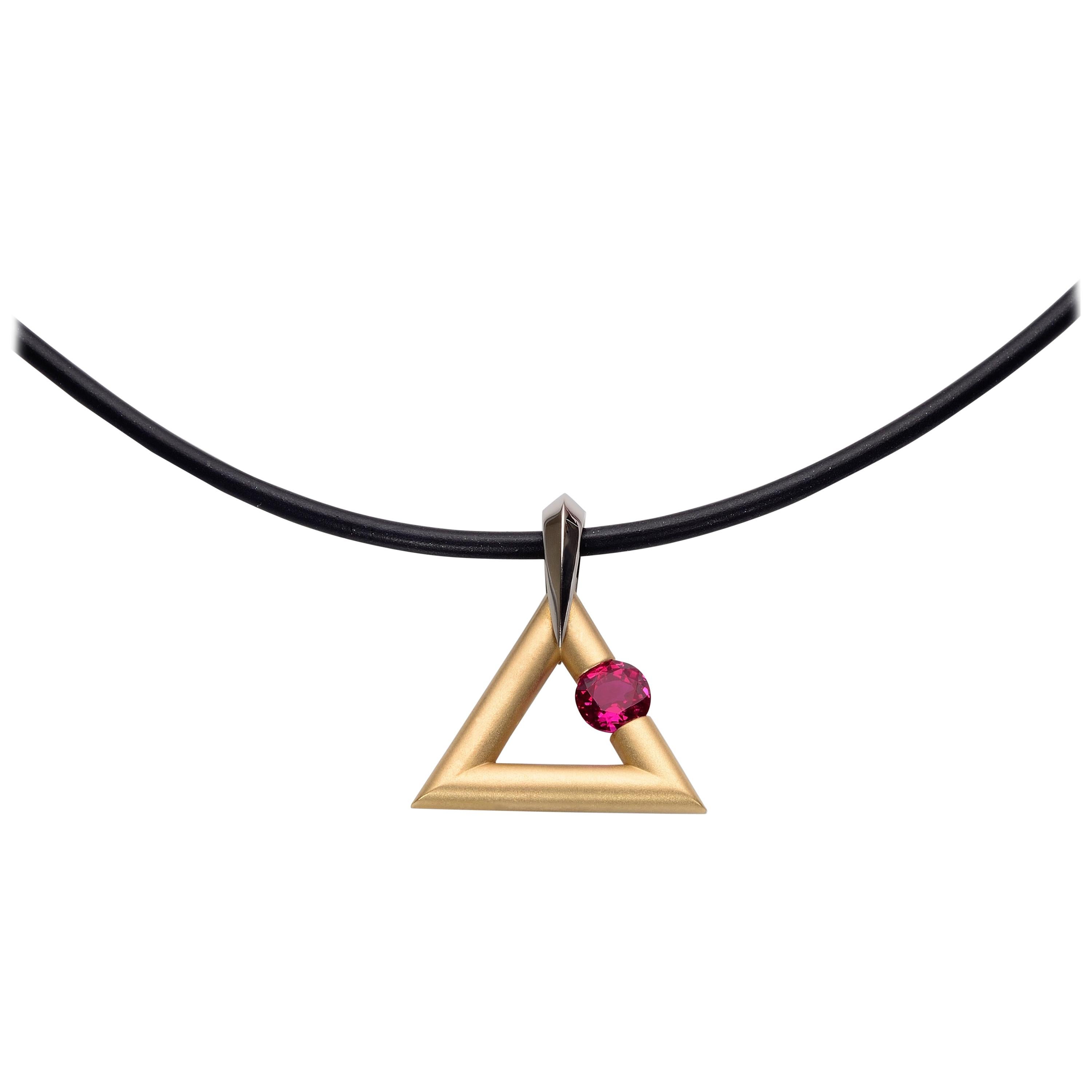 Steven Kretchmer 18K Yellow Gold Logo Pendant with a Tension-Set 0.63ct. Ruby  For Sale