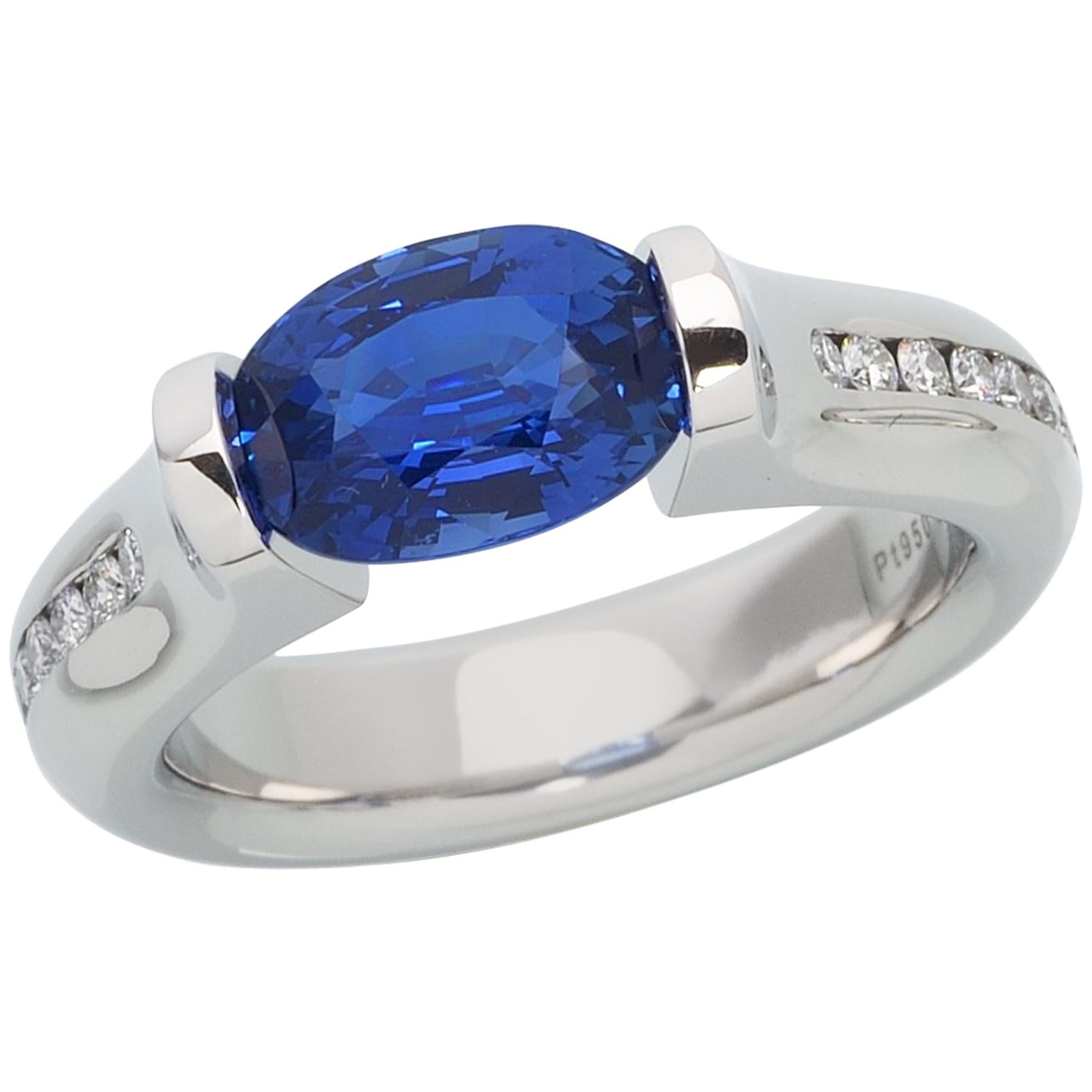 Steven Kretchmer Omega Channel Ring with a Tension-Set Blue Sapphire For Sale