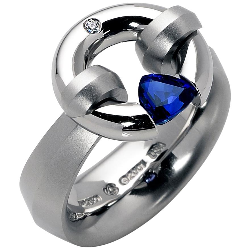 Steven Kretchmer Platinum Jazz Ring with a Tension-Set .69 ct. Blue Sapphire For Sale