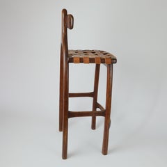 Sgabello Steven Spiro Studio A con seduta in pelle.