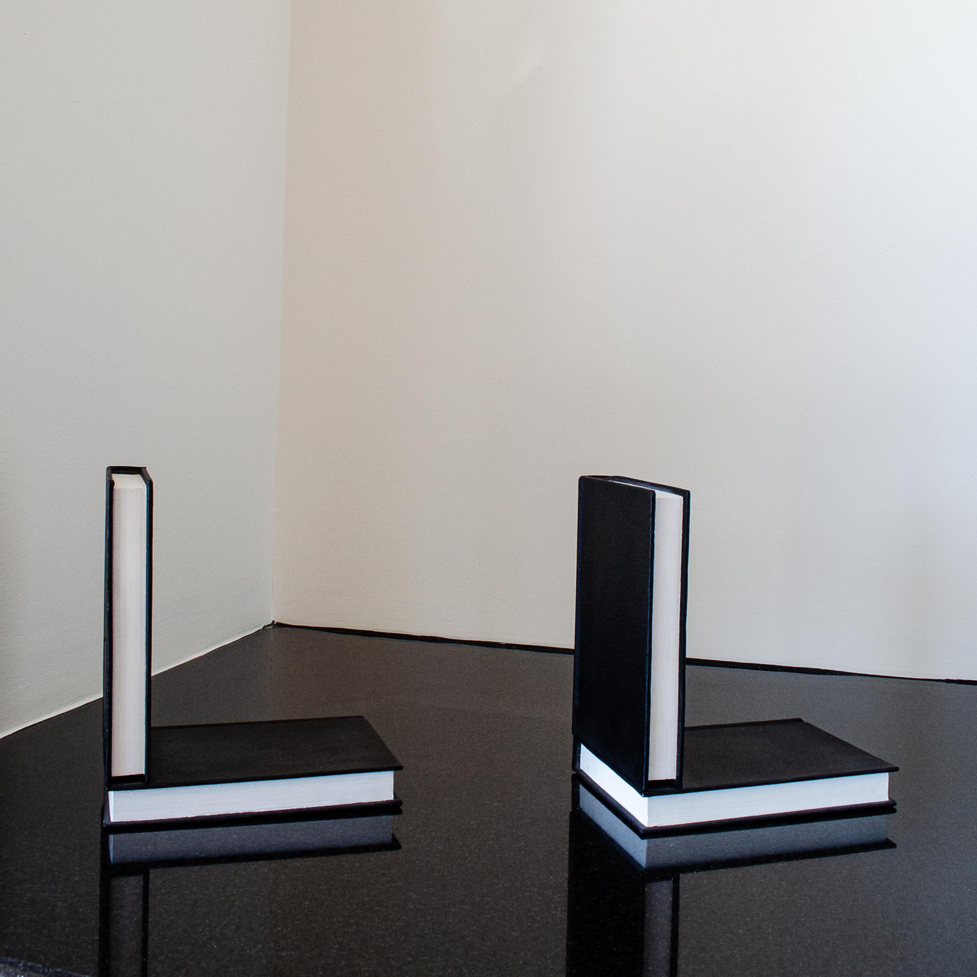 Steven Wolfe
Untitled (Bookends), 1990
Stamped: SW 1990 2/3
Painted Bronze
6 1/4 x 7 x 4 inches
Edition 2/3


Steven Wolfe crafted sculptures and drawings of remarkable skill and visual impact. Wolfe reimagined aged books and utilized records,