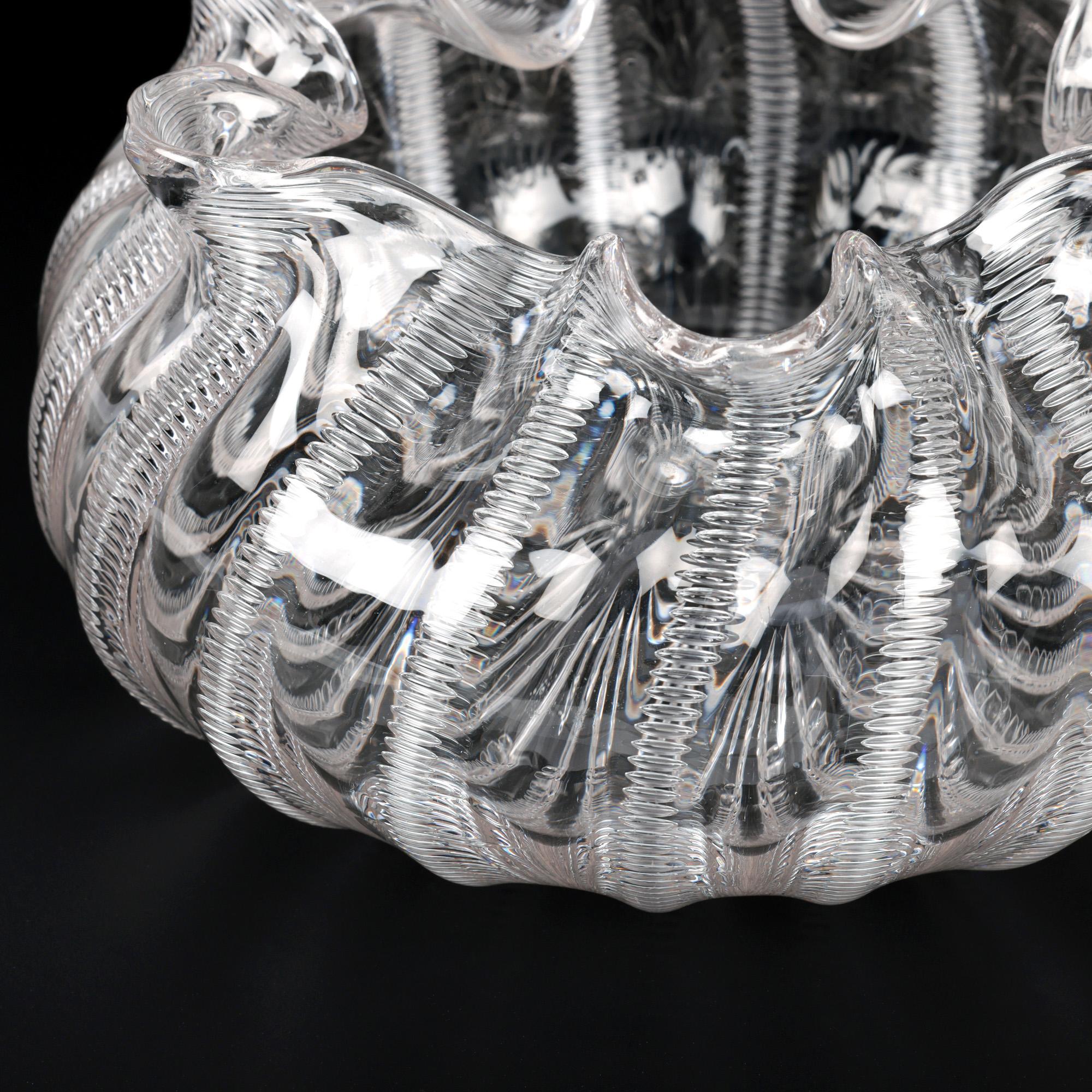 A fine quality aesthetic movement English glass bowl decorated in a Jewel pattern by renowned Stourbridge glass makers Stevens & Williams and dated 1886. The crystal glass bowl is of wide round shape and is hand-blown with a slight vertical ribbed