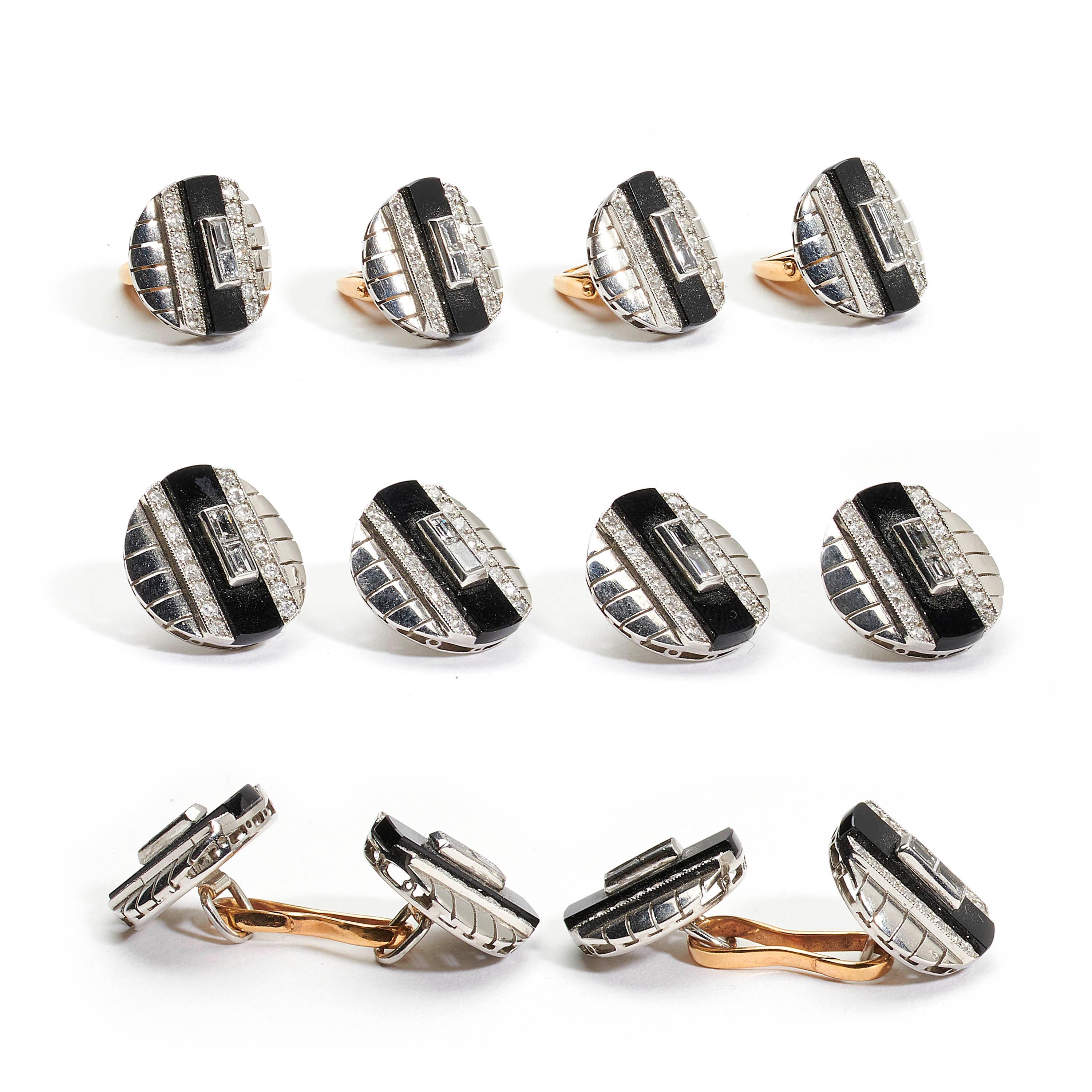 An Art Deco black onyx and diamond dress-set, comprising cufflinks, buttons and collar studs, set with baguette-cut diamonds in the centre, on a rectangle of black onyx, with a row of old-cut diamonds either side, with millegrain edges, mounted in