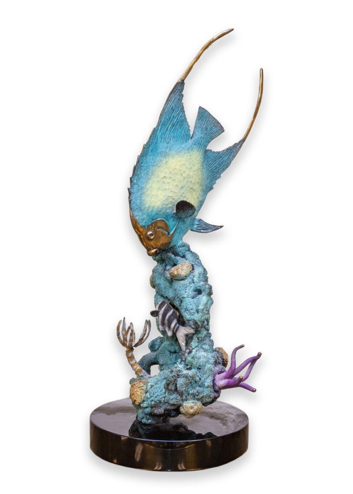A Stewart & Steven Wegner Queen Angel Reef patina bronze sculpture signed and numbered 38/40. Measures 18.75 in tall, and has a 7 in base diameter. 
