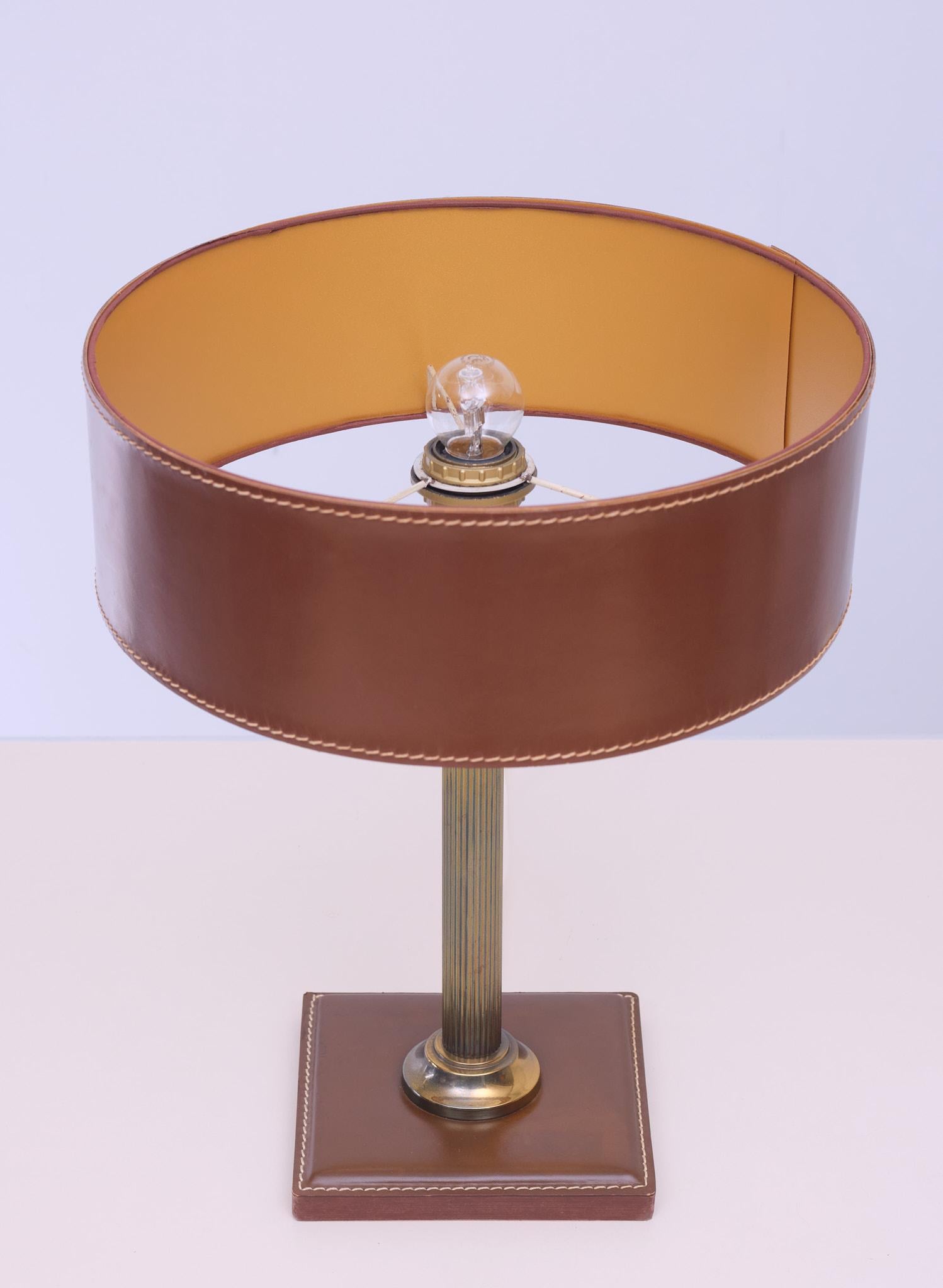 Very nice Stich Leather clad lamp. Attributed to Jacques Adnet 1960s.