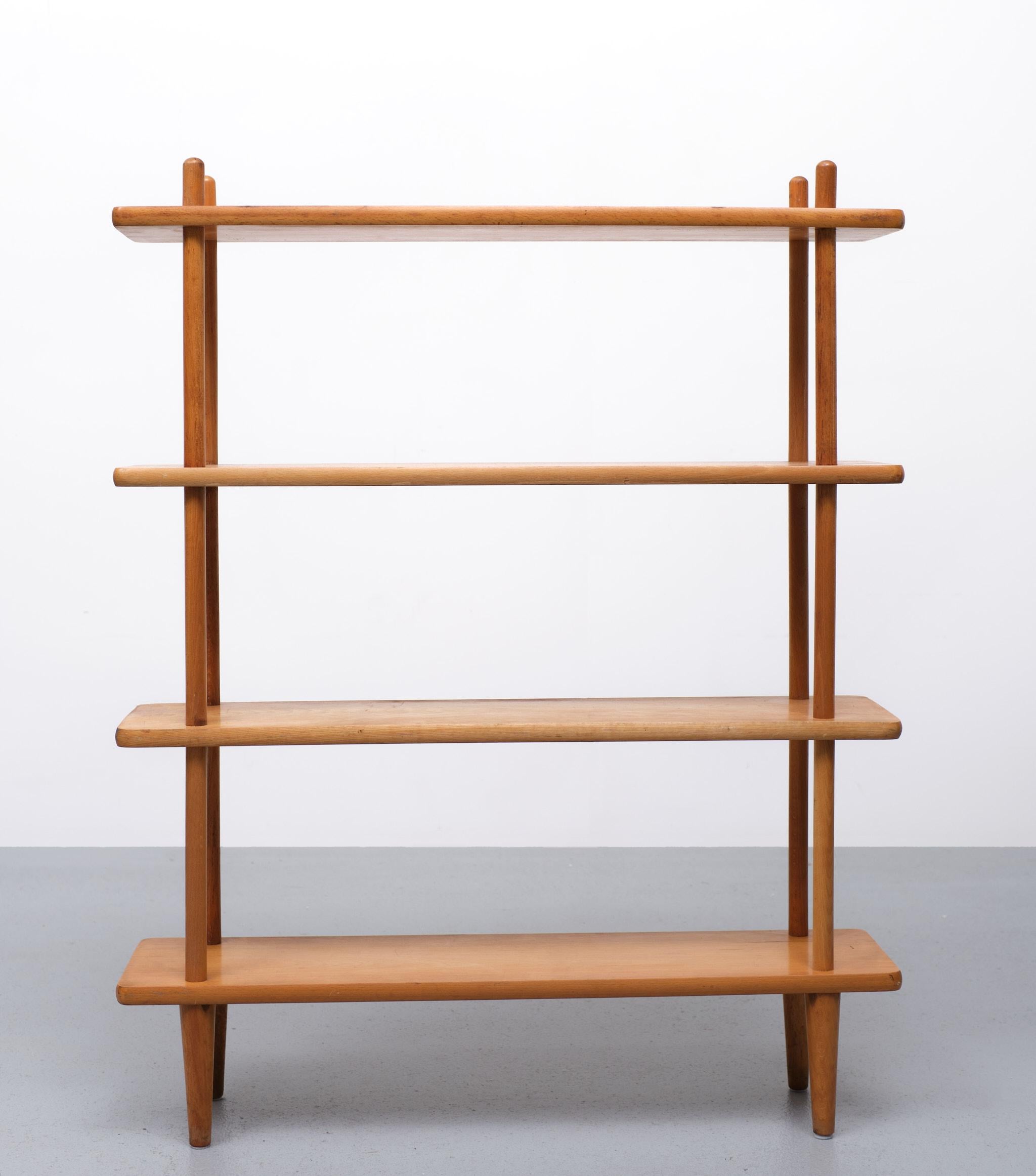 Vintage stokke cabinet. A design by Willem Lutjens for Den Boer Gouda, Netherlands, 1960s.
Beech-colored cabinet with clean lines, to be used as a bookcase against the wall, but also suitable as a room divider.
The sticks have a steel threaded end