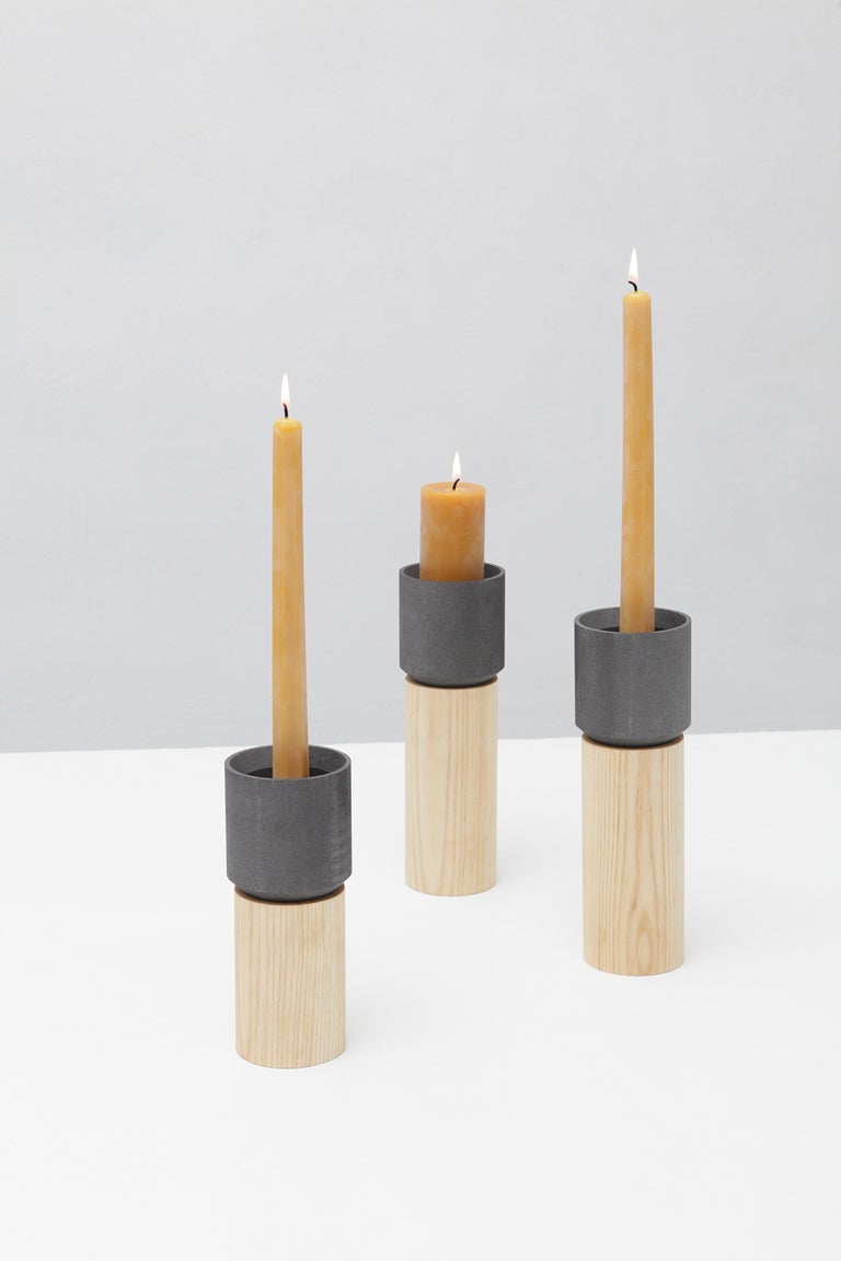 A graphite cup, naturally heat-resistant and non-stick, protects wooden pedestal from candle flame and dripping wax. 

Designed to be used with our pillar or hexagonal beeswax candles.

Dimensions:
Large height 9.75 in / 24.8 cm
Small height