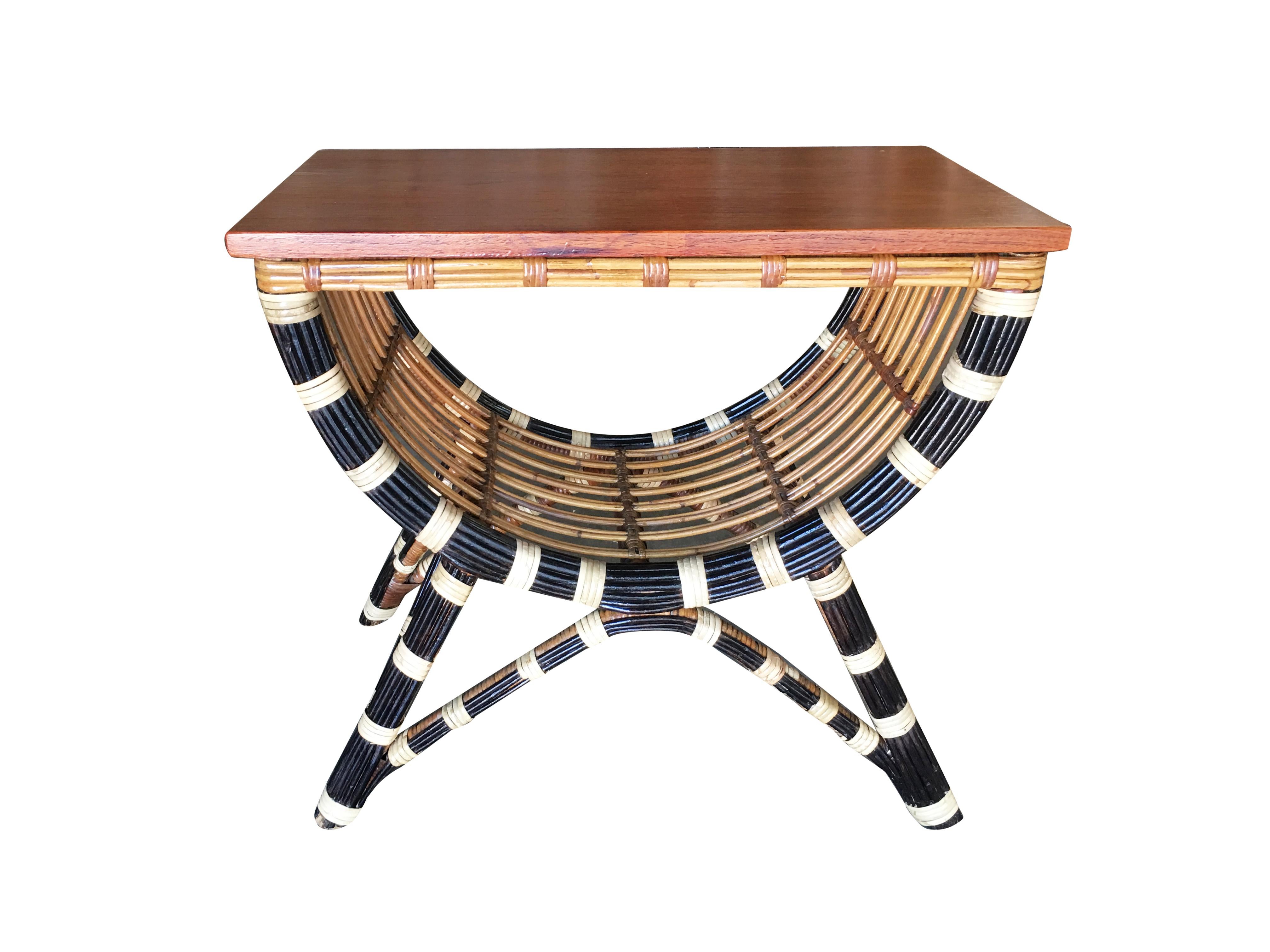Unique striped Albini style side table with mahogany tabletop featuring a unique black and white striped stick rattan base.

Restored to new for you.

All rattan, bamboo and wicker furniture has been painstakingly refurbished to the highest