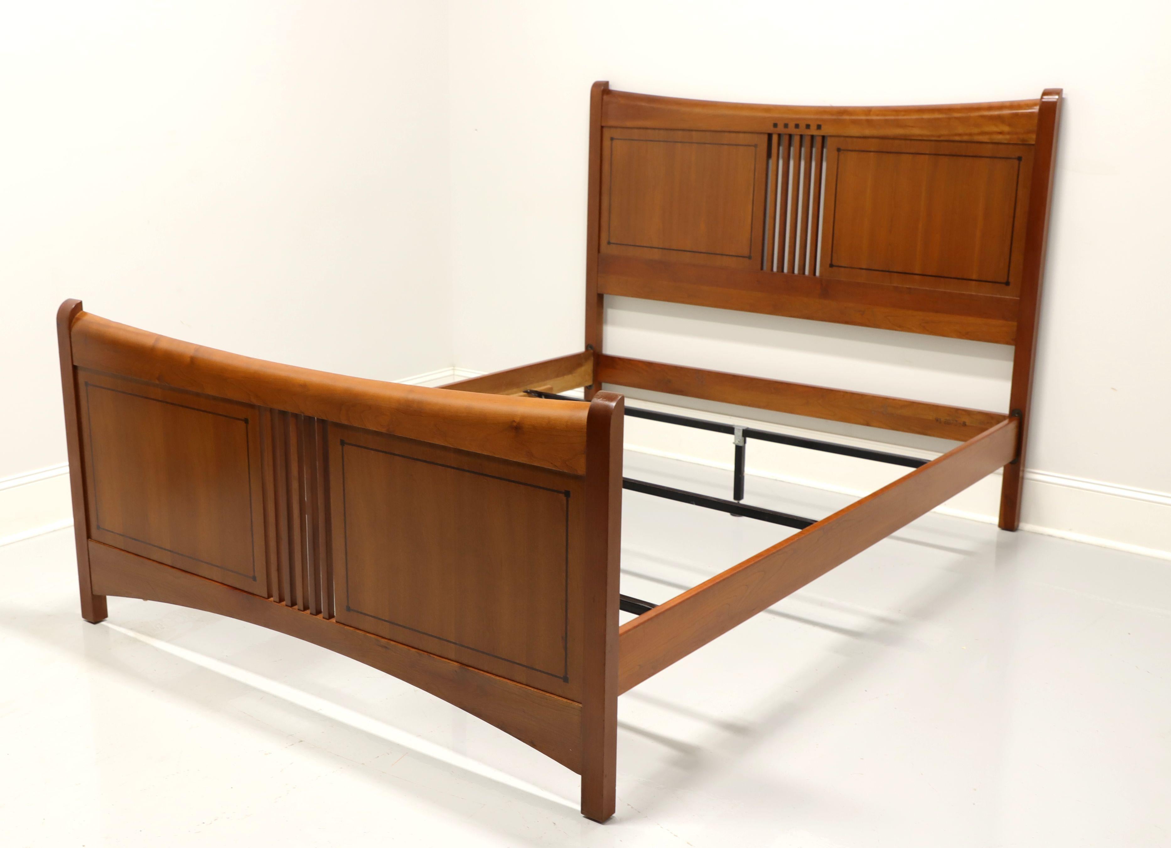 An Arts & Crafts / Mission style queen size bed by Stickley, from their 21st century Collection. Solid cherry wood with accent inlays and distinctive open slat design. Includes headboard, footboard, side rails and three adjustable metal mattress