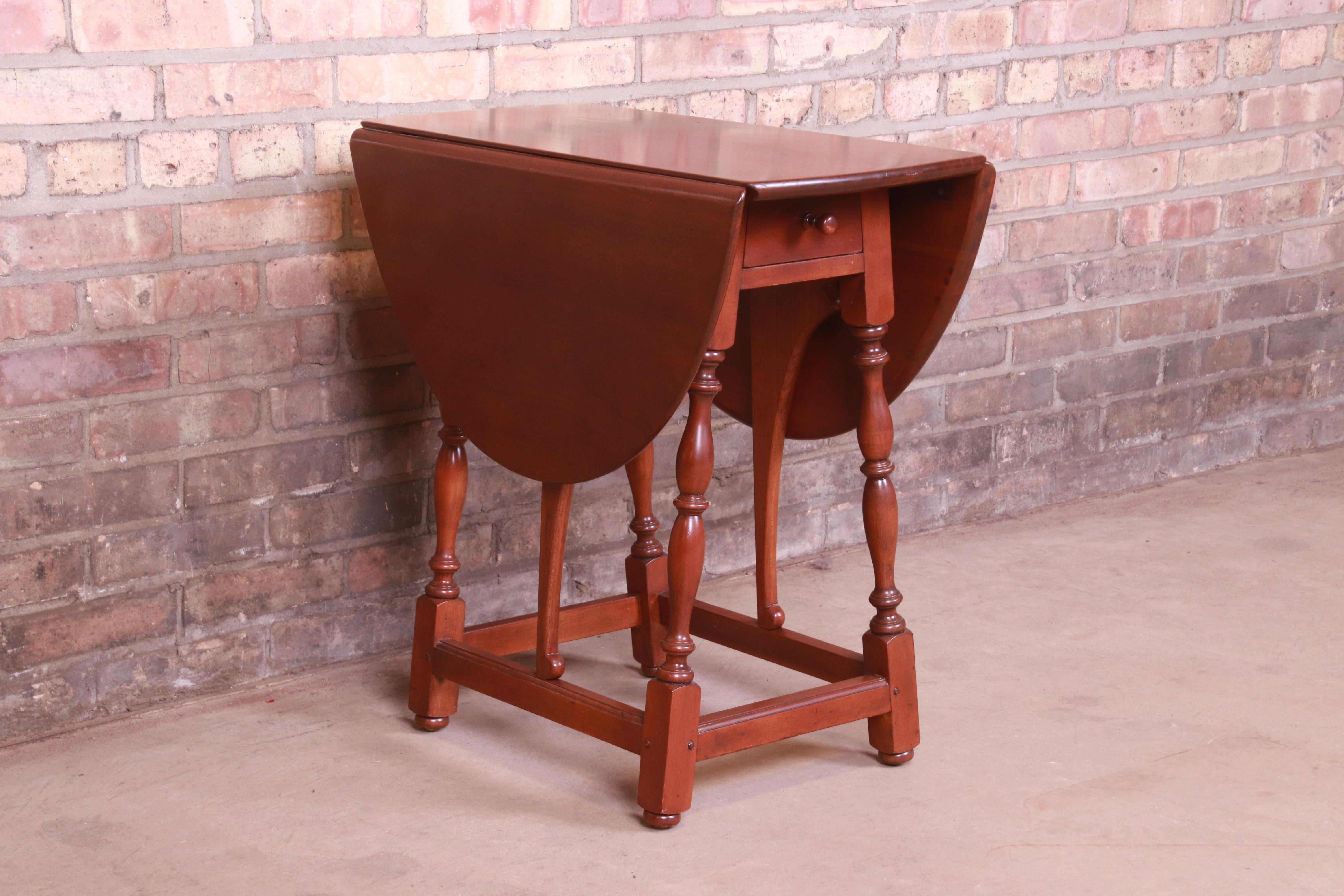 cherry wood drop leaf table