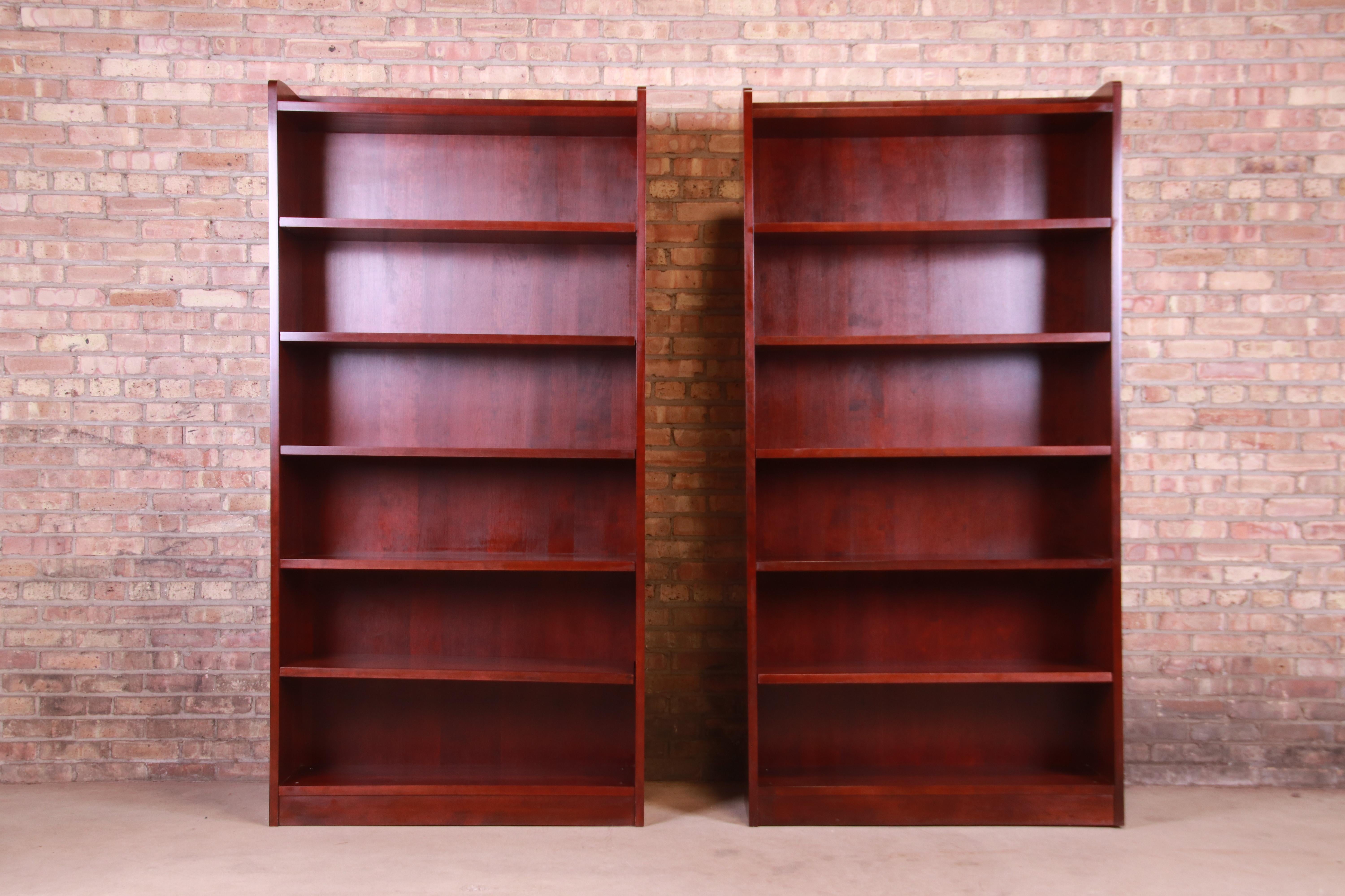 An exceptional pair of Arts & Crafts style cherrywood tall bookcases

By Stickley

USA, 2008

Measures: 40