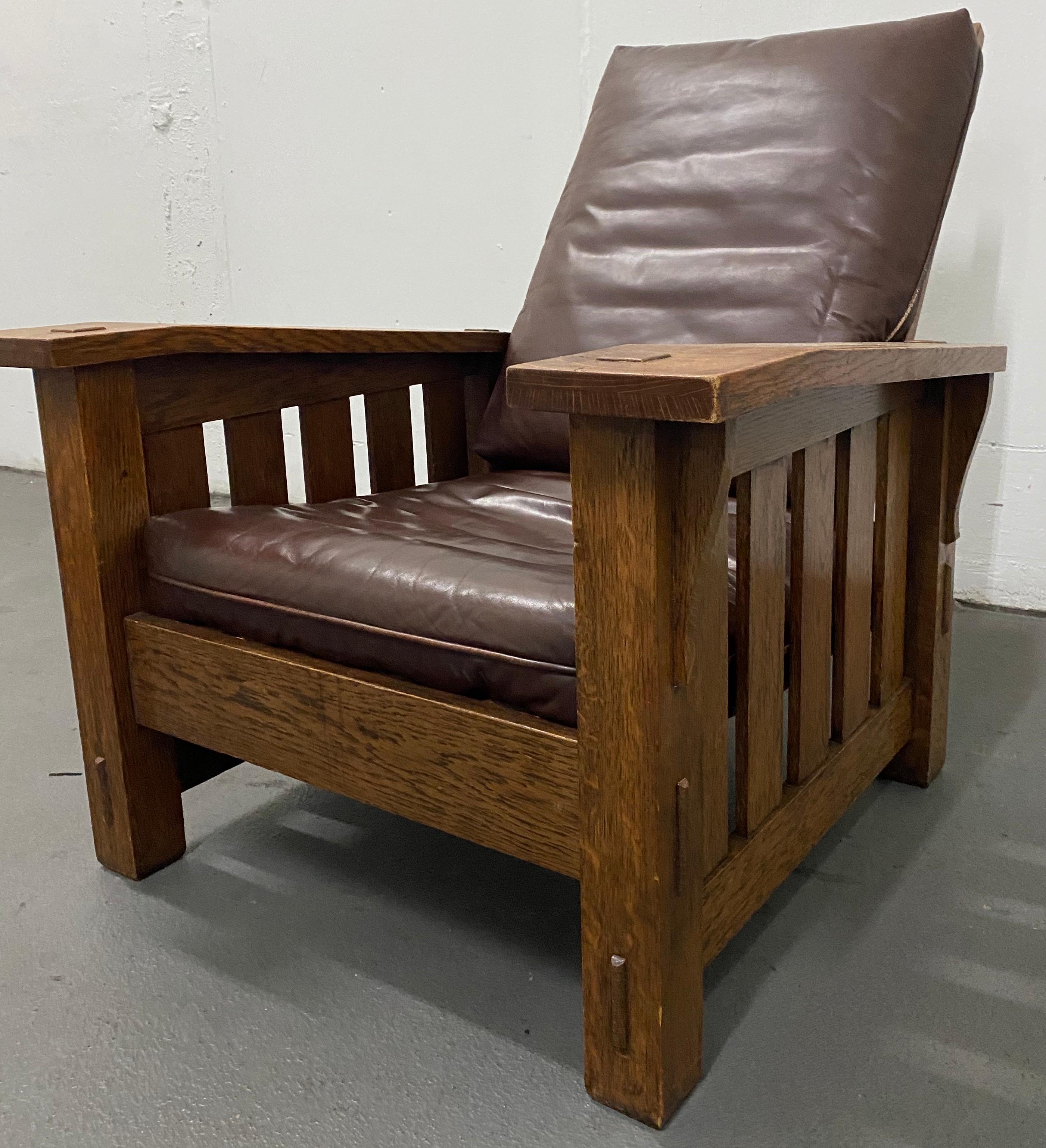 Arts & Crafts Mission oak and leather armchair by Stickley, circa 1920

Measures: 33.75