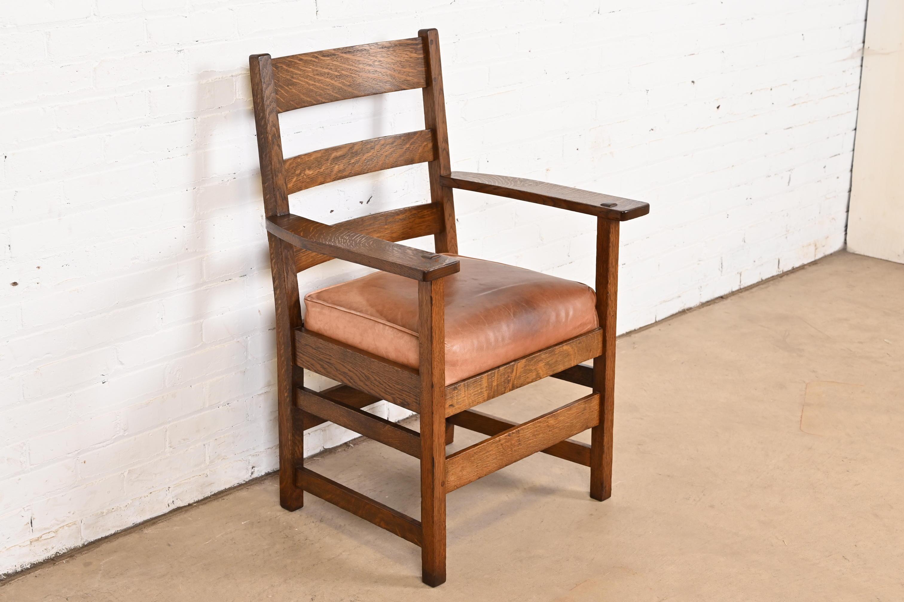 An exceptional Mission or Arts & Crafts club chair or dining armchair

By Stickley Brothers 

USA, Circa 1900

Solid quarter sawn oak frame, with leather upholstered seat.

Measures: 25.75