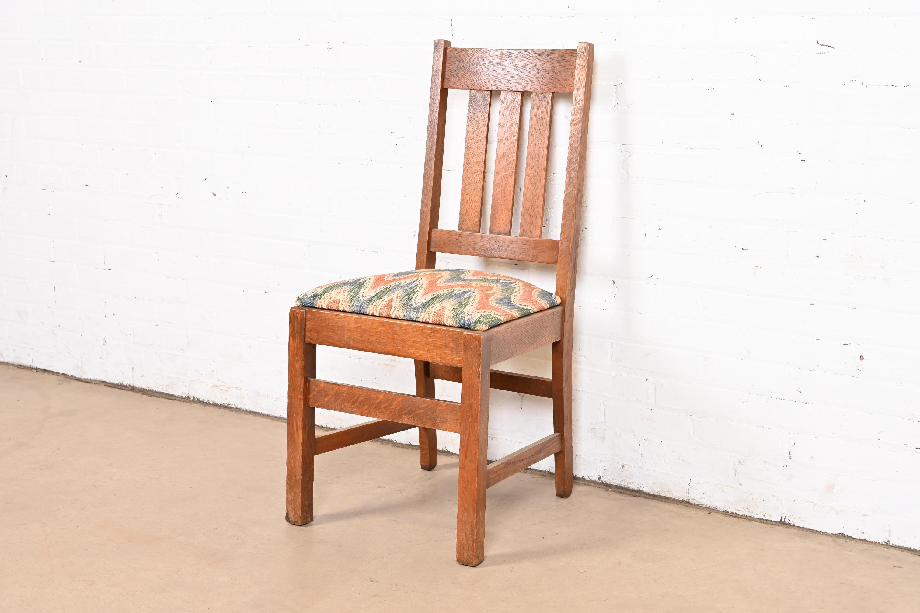 An exceptional antique Mission or Arts & Crafts desk chair, side chair, or dining chair

Attributed to Stickley Brothers

USA, Early 20th Century

Solid quarter sawn oak, with upholstered seat.

Measures: 17.5
