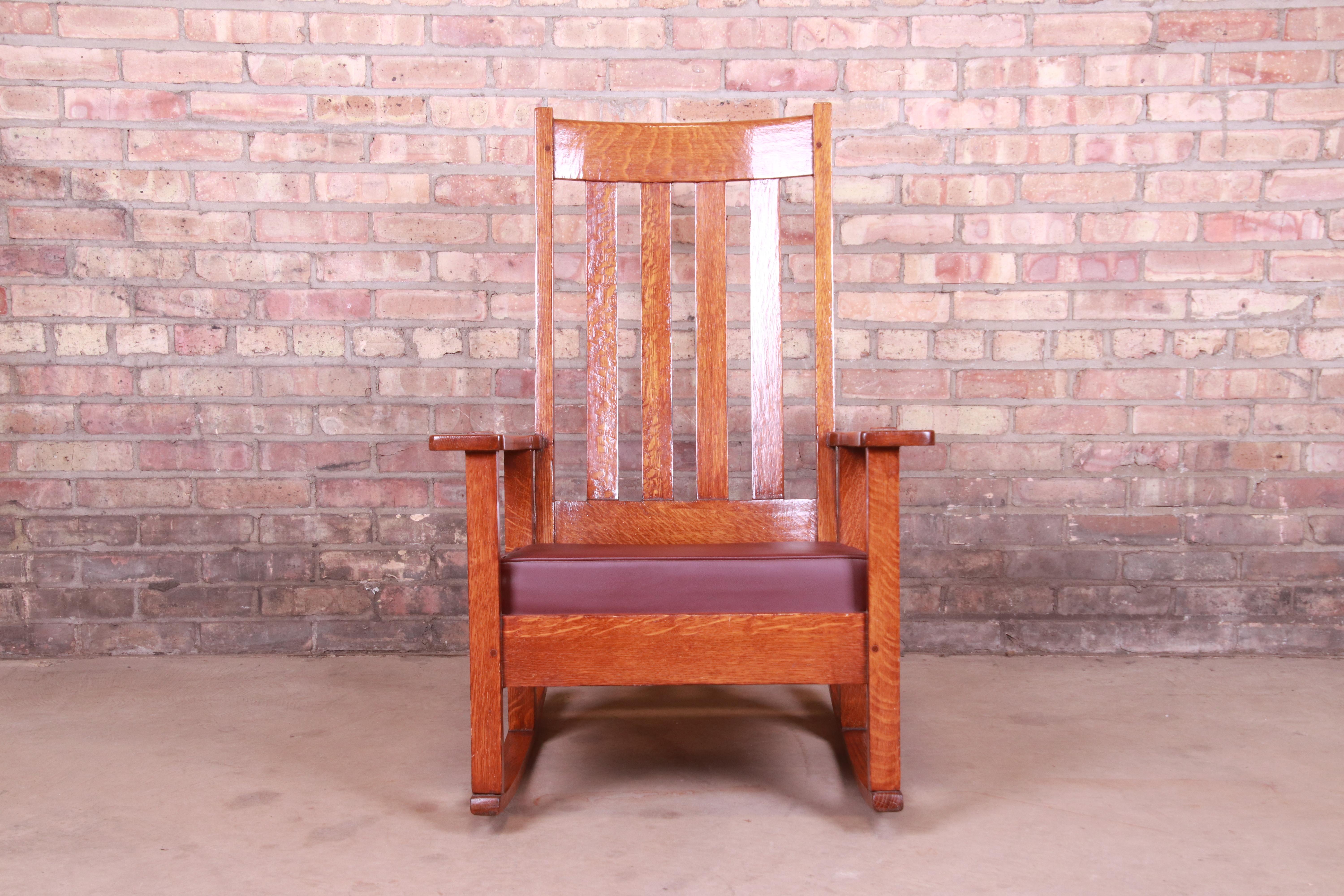 An exceptional Arts & Crafts period rocking chair

By Stickley Brothers

USA, circa 1900

Quarter sawn oak, with burgundy leather upholstery.

Measures: 27.25