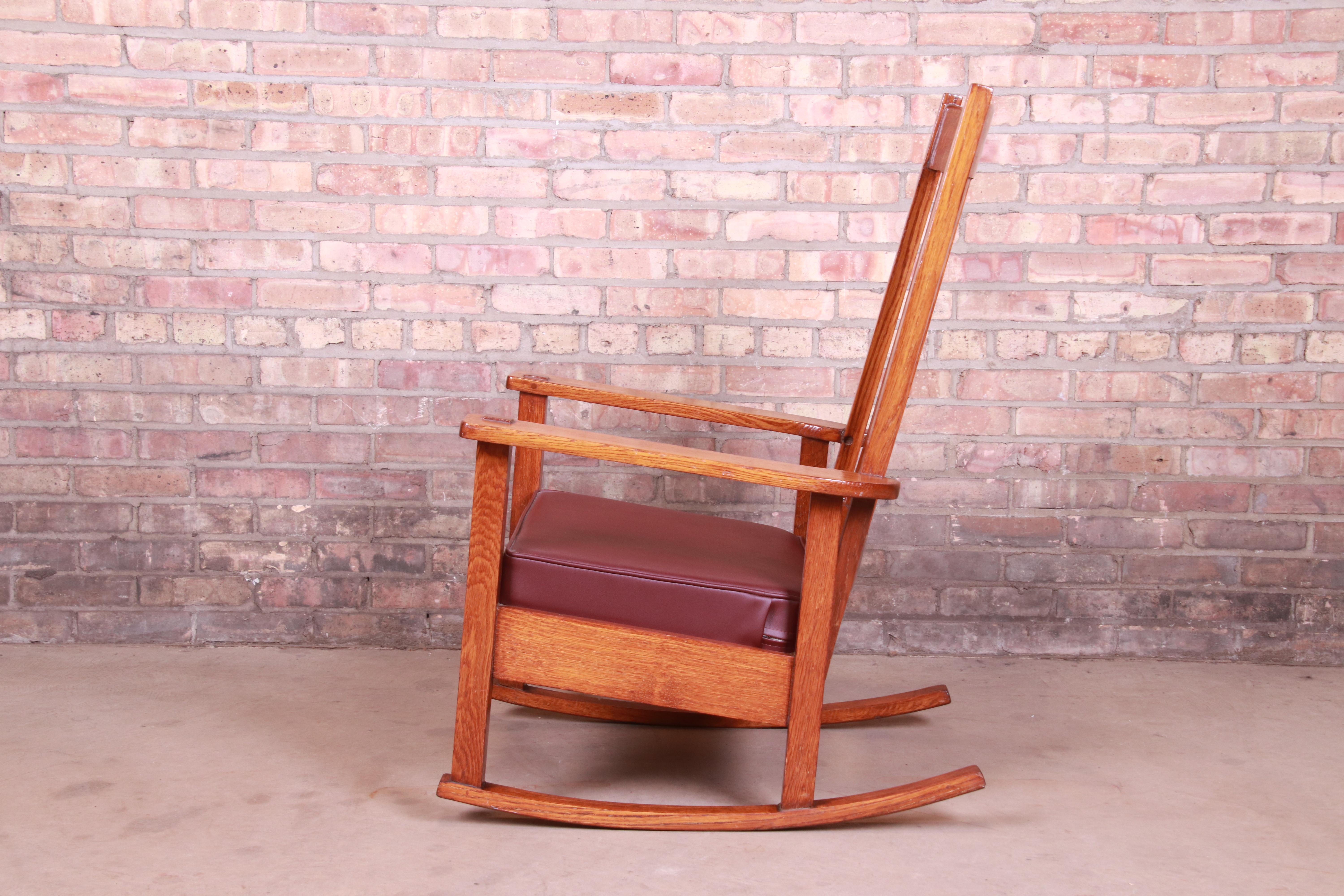 20th Century Stickley Brothers Arts & Crafts Oak and Leather Rocking Chair, circa 1900