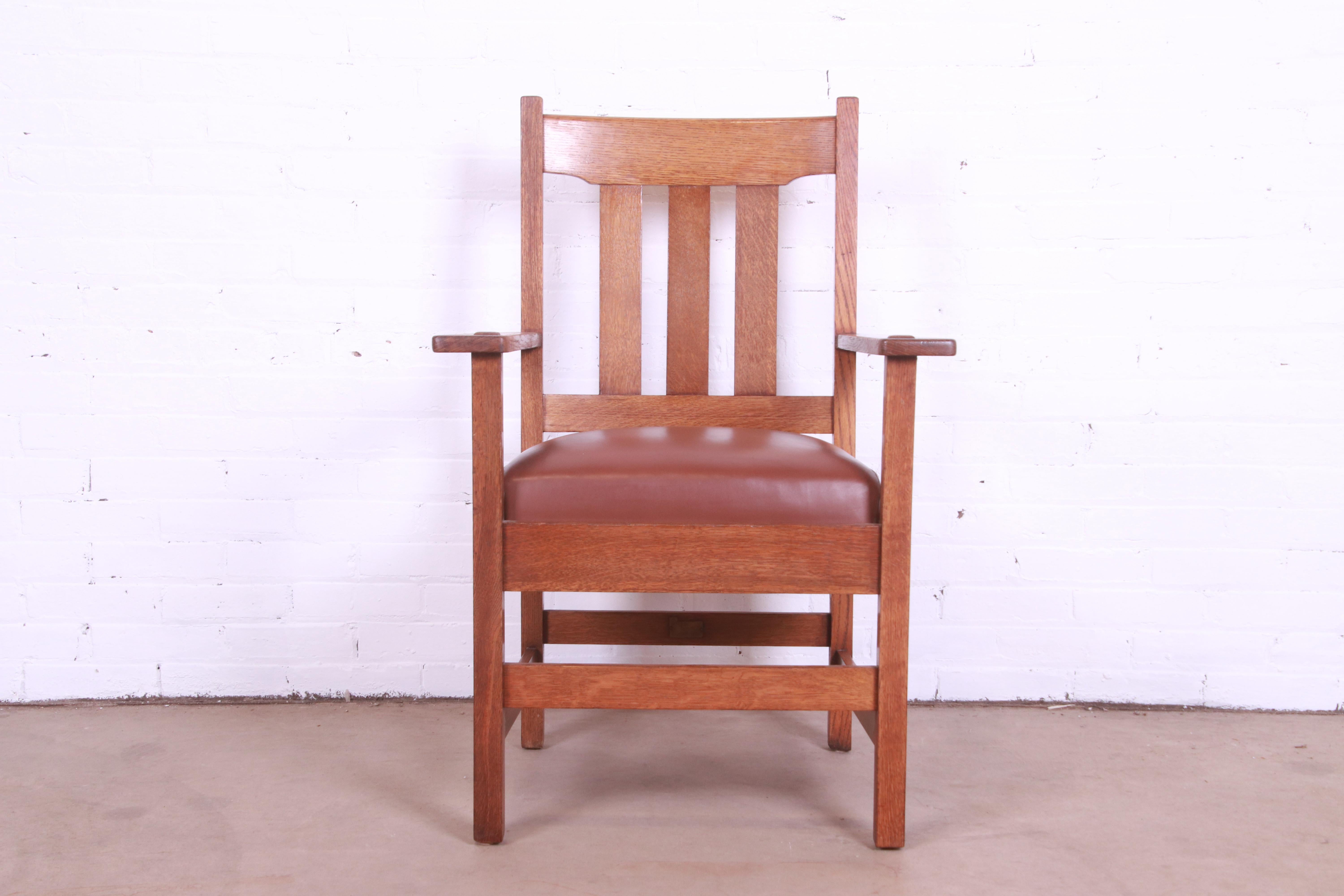 A rare and exceptional pair of Mission Arts & Crafts club chairs or dining armchairs

By Stickley Brothers

USA, Circa 1900

Solid quarter sawn oak frames, with leather upholstered seats.

Measures: 26