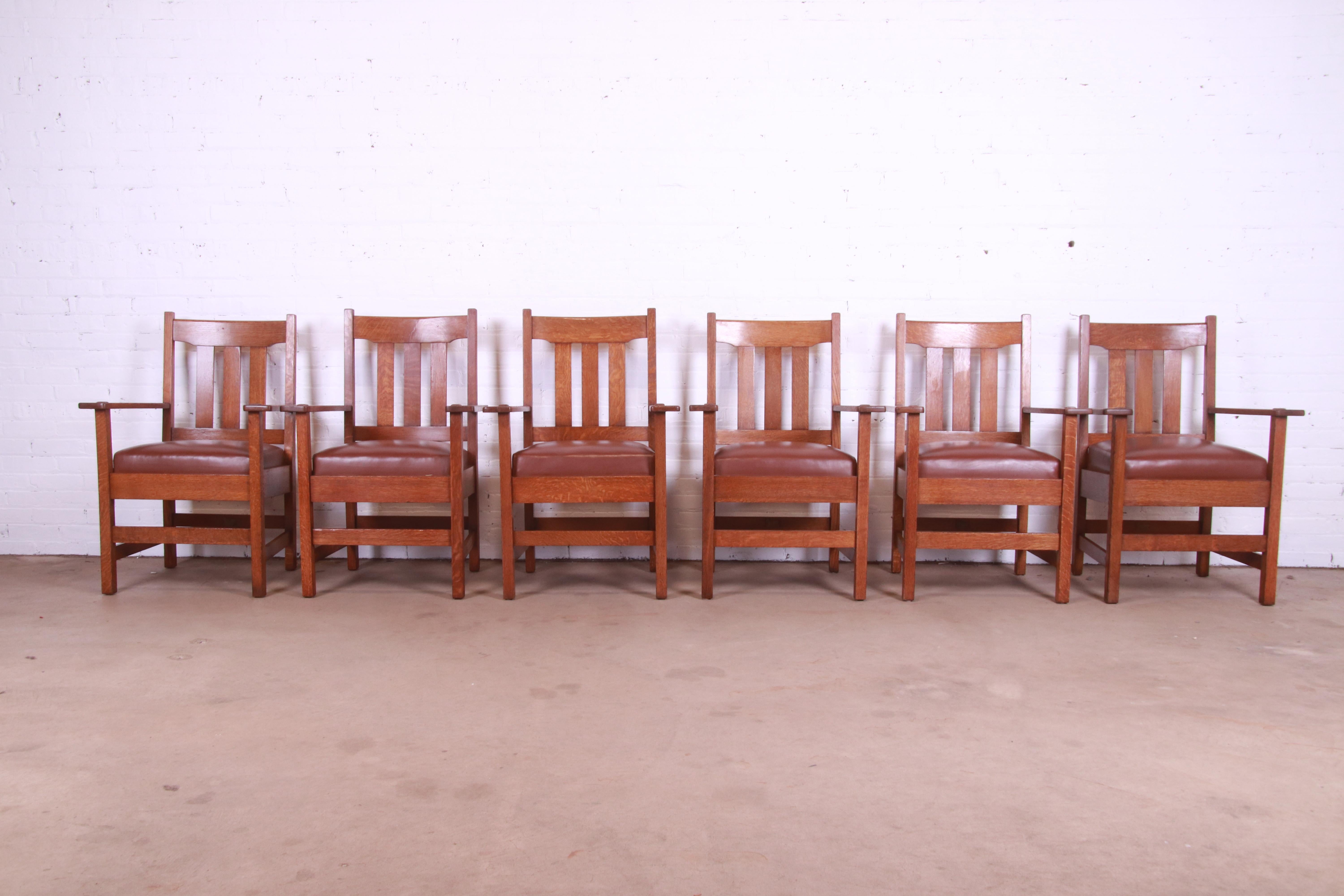 A rare and exceptional set of six Mission Arts & Crafts dining armchairs

By Stickley Brothers

USA, Circa 1900

Solid quarter sawn oak frames, with leather upholstered seats.

Measures: 26