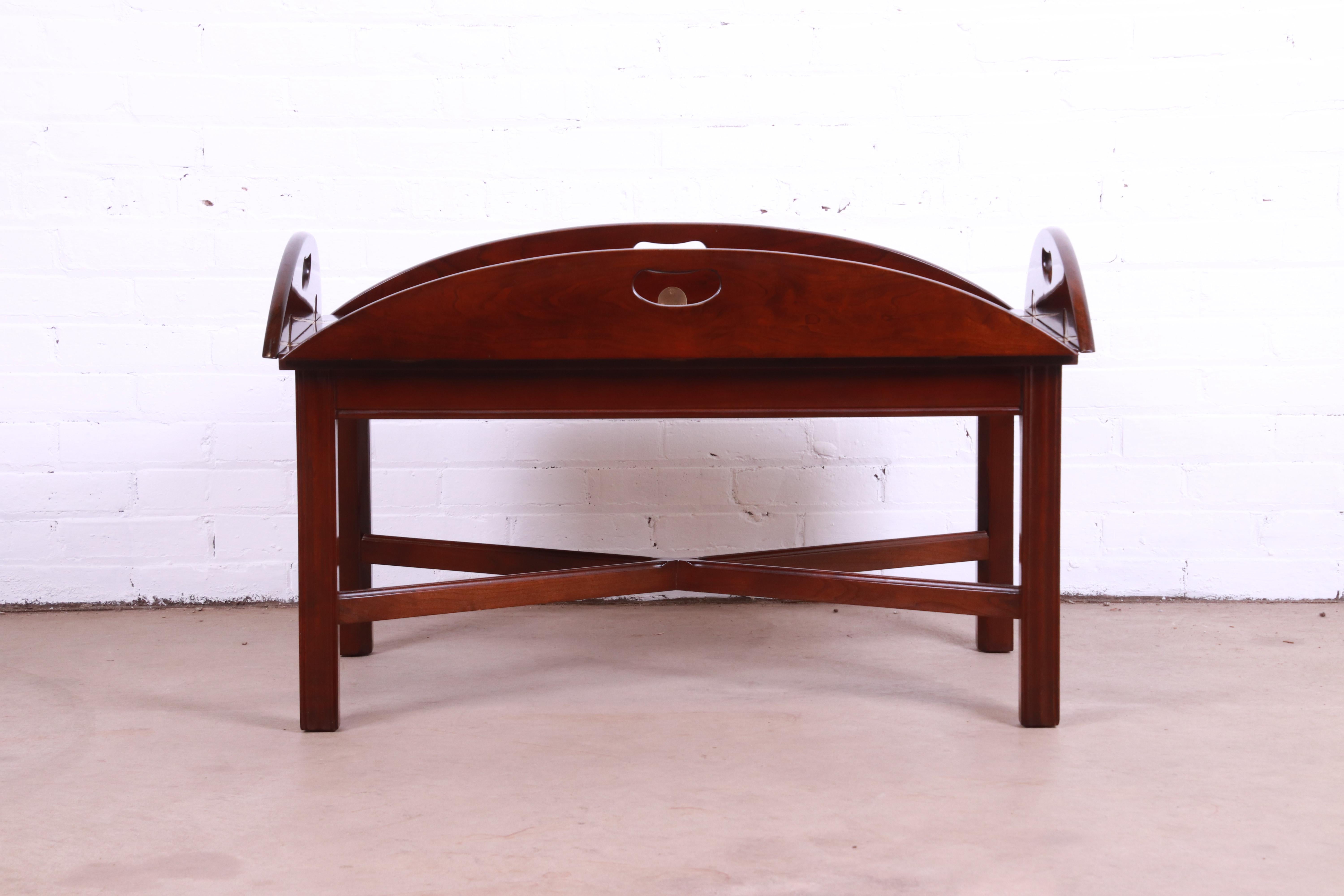 A gorgeous Chippendale or Georgian style butler's coffee table

By Stickley

USA, Late 20th Century

Gorgeous cherry wood, with brass hinges.

Measures: 46